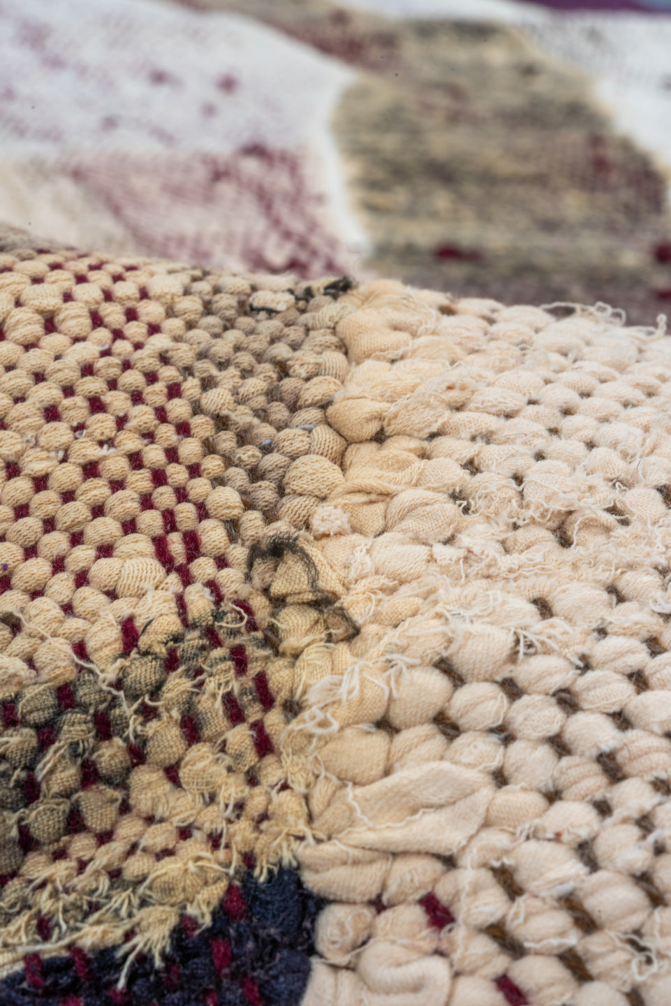 4' x 8' one-of-a-kind handmade vintage Rag Rug rug. Color palette: ivory, charcoal, plum, crimson, lavender, sky blue, brown