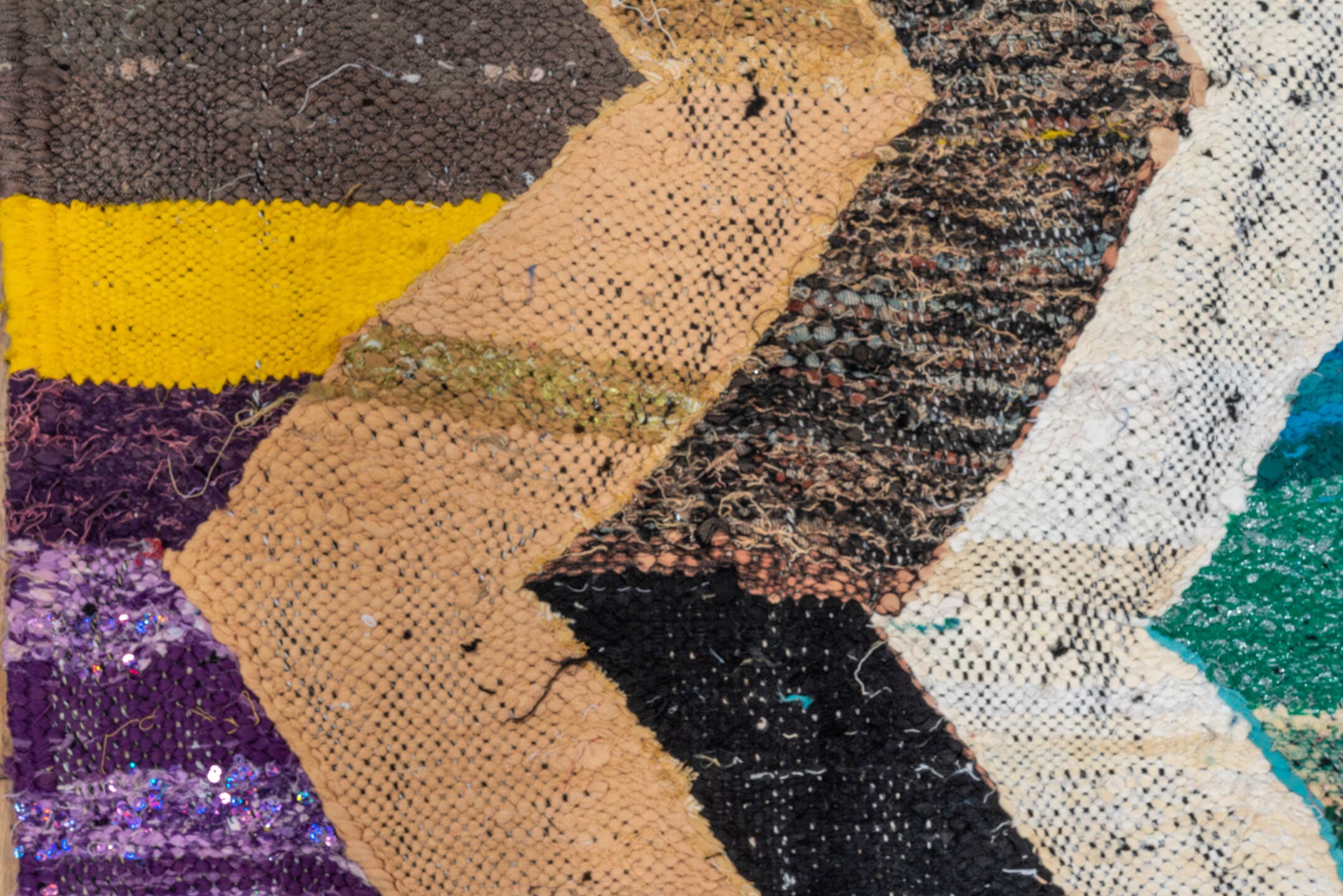 4' x 6' one-of-a-kind handmade vintage Rag Rug small size rug. Color palette: ivory, camel, teal, plum, charcoal, red, taupe
