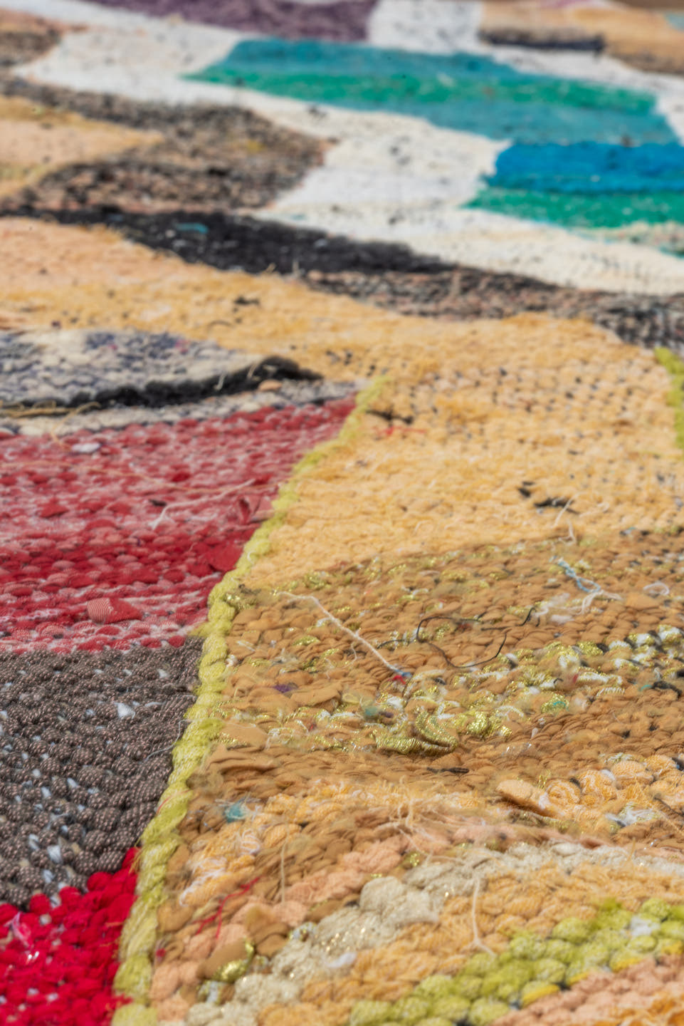 4' x 6' one-of-a-kind handmade vintage Rag Rug small size rug. Color palette: ivory, camel, teal, plum, charcoal, red, taupe