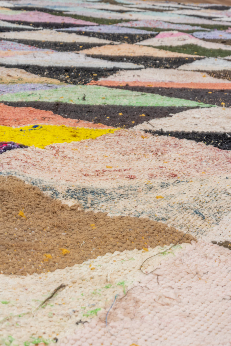 5' x 9' one-of-a-kind handmade vintage Rag Rug medium size rug. Color palette: ivory, black, sand, blush, sky blue, mint