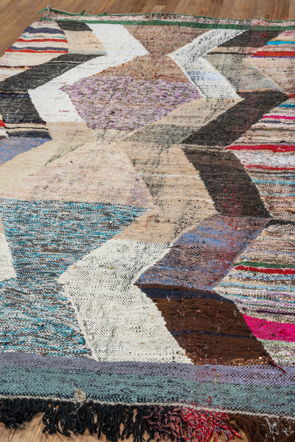4' x 8' one-of-a-kind handmade vintage Rag Rug rug. Color palette: ivory, taupe, charcoal, cream, turquoise, lavender, green