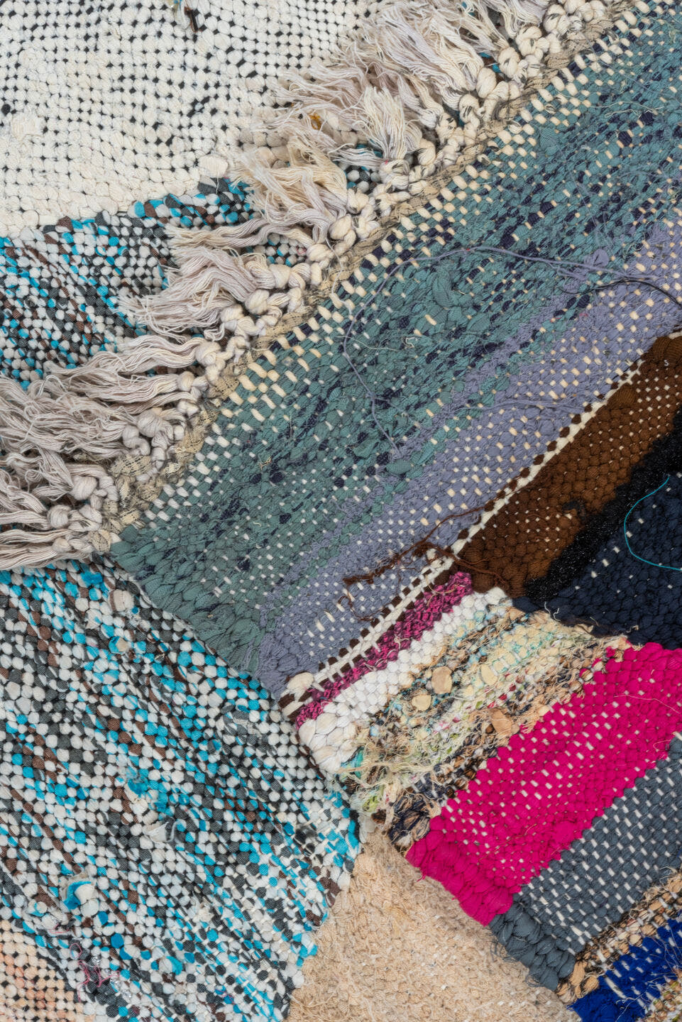 4' x 8' one-of-a-kind handmade vintage Rag Rug rug. Color palette: ivory, taupe, charcoal, cream, turquoise, lavender, green