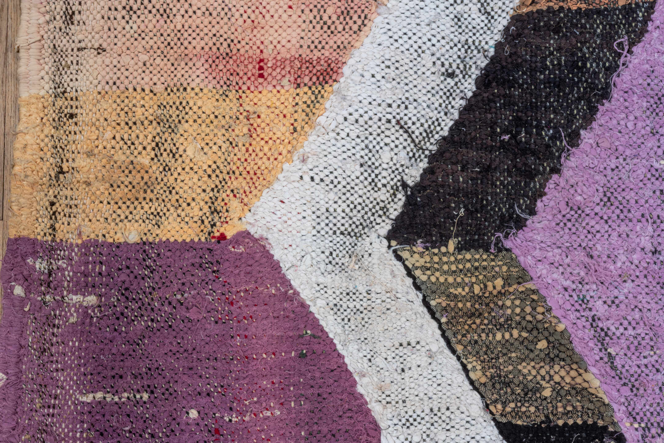 4' x 8' one-of-a-kind handmade vintage Rag Rug rug. Color palette: ivory, black, lavender, turquoise, blush, olive, ochre