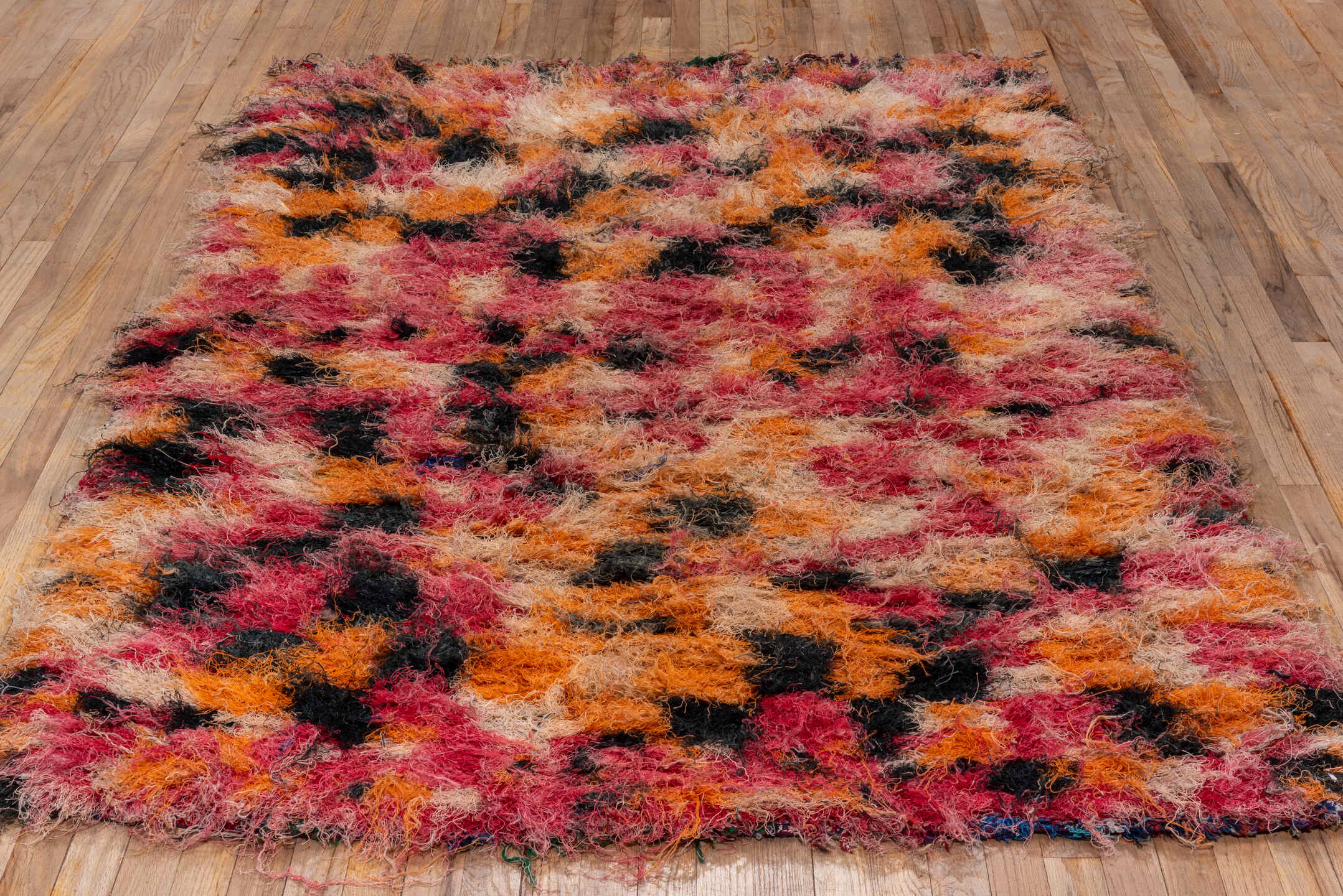 4' x 7' one-of-a-kind handmade vintage Rag Rug rug. Color palette: rose, orange, ivory, black, blush, peach, taupe, pink