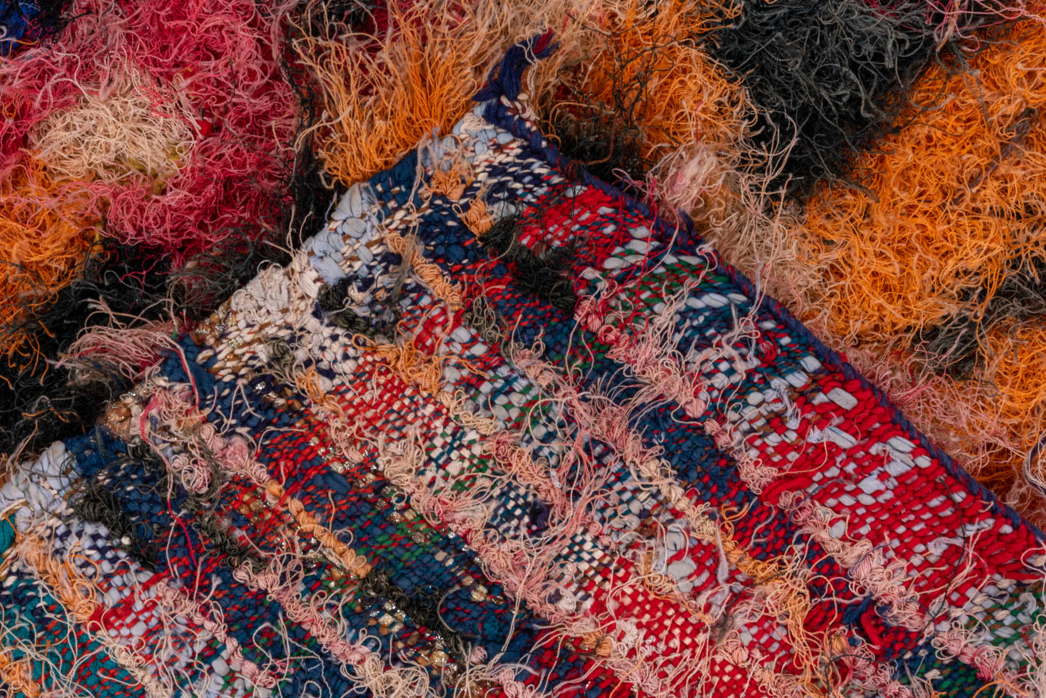 4' x 7' one-of-a-kind handmade vintage Rag Rug rug. Color palette: rose, orange, ivory, black, blush, peach, taupe, pink
