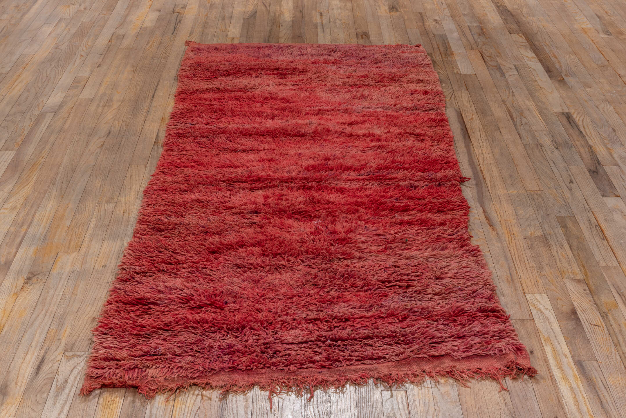 3' x 8' one-of-a-kind handmade vintage Moroccan runner rug. Color palette: red, crimson, rose, terra cotta, pink, terracotta