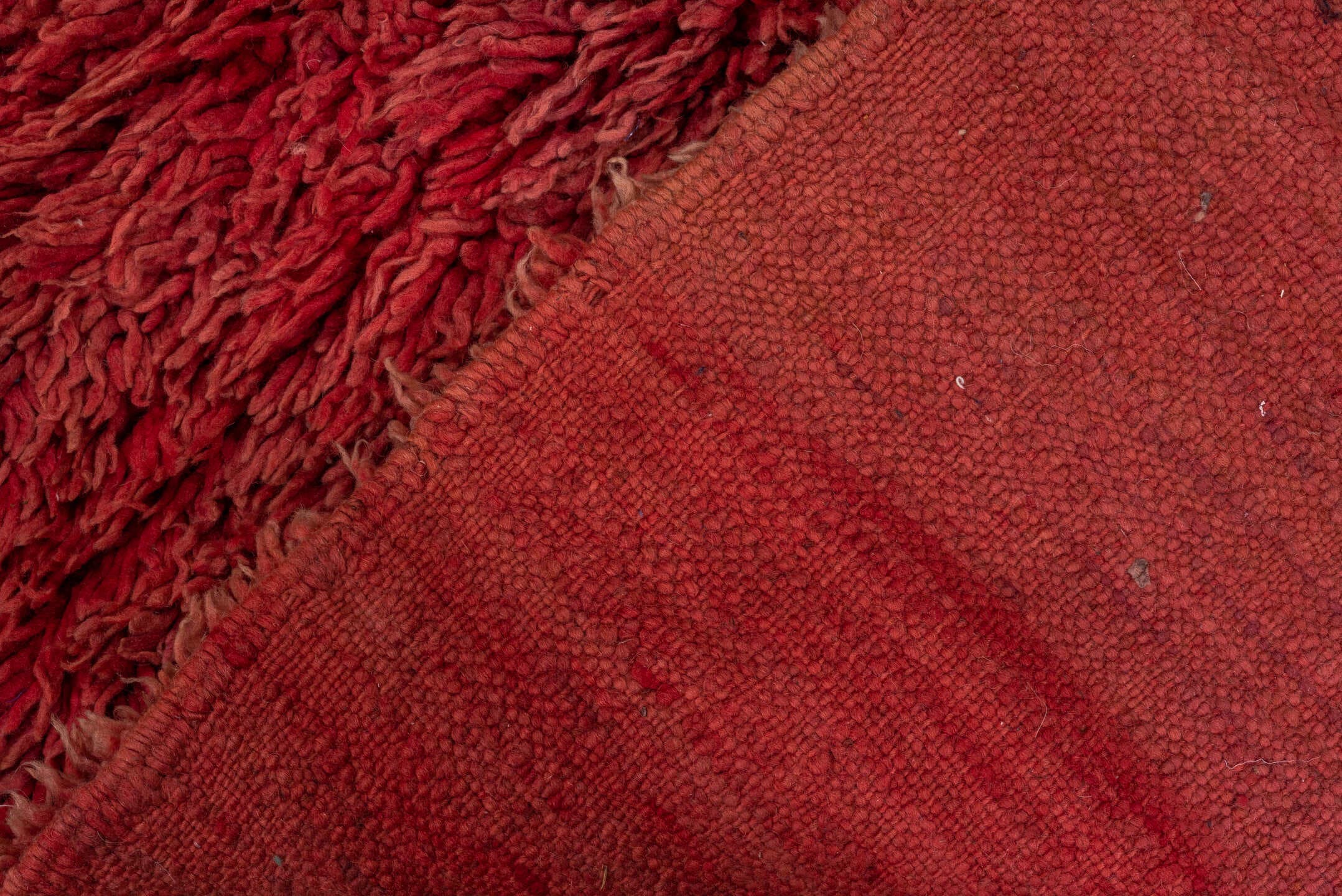 3' x 8' one-of-a-kind handmade vintage Moroccan runner rug. Color palette: red, crimson, rose, terra cotta, pink, terracotta