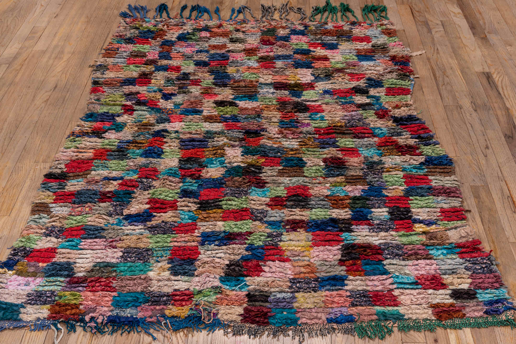 4' x 6' one-of-a-kind handmade vintage Rag Rug small size rug. Color palette: black, blue, brown, cadet blue, fire brick