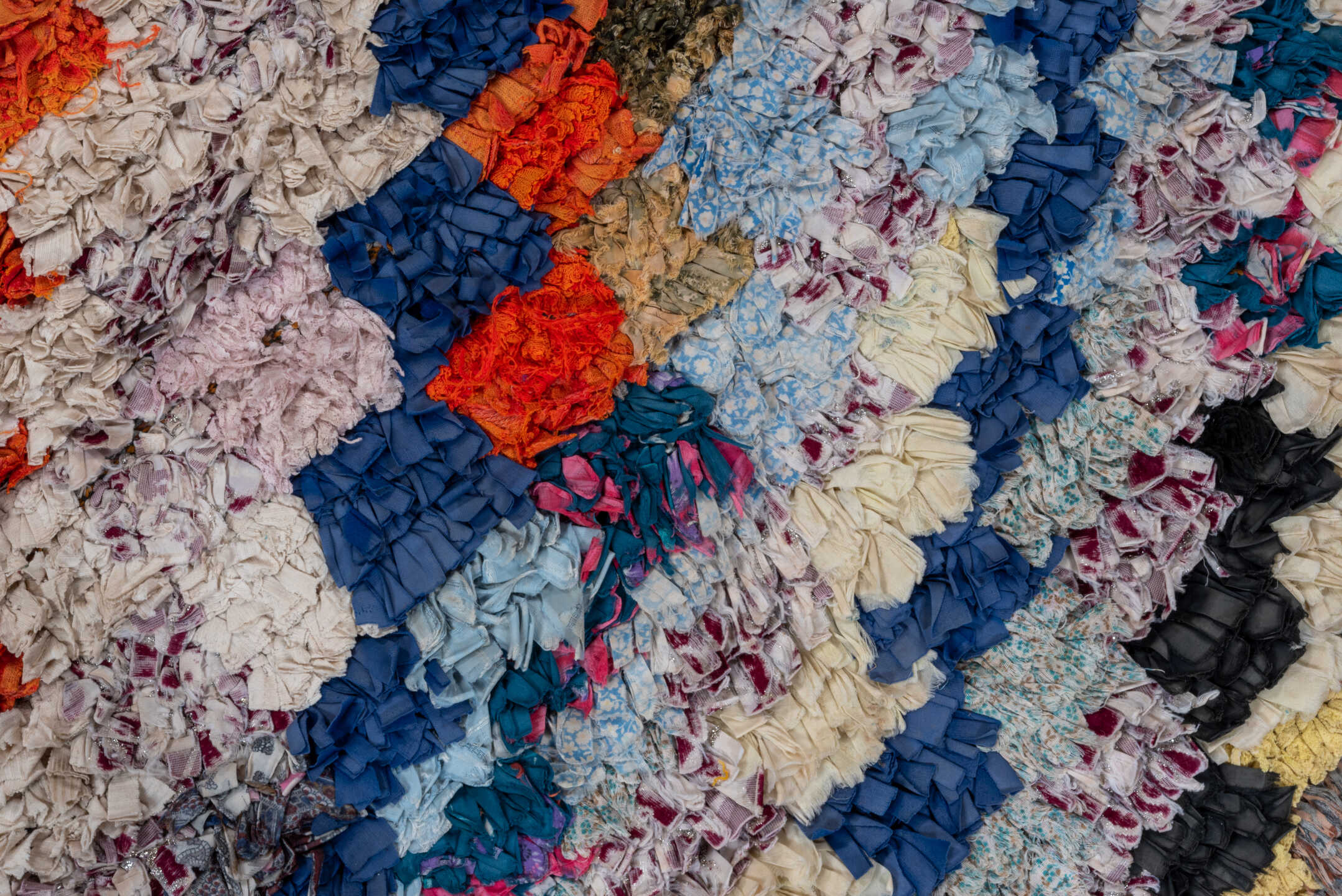 2' x 6' one-of-a-kind handmade vintage Rag Rug runner rug. Color palette: ivory, slate, turquoise, blue, brown, pink, coral