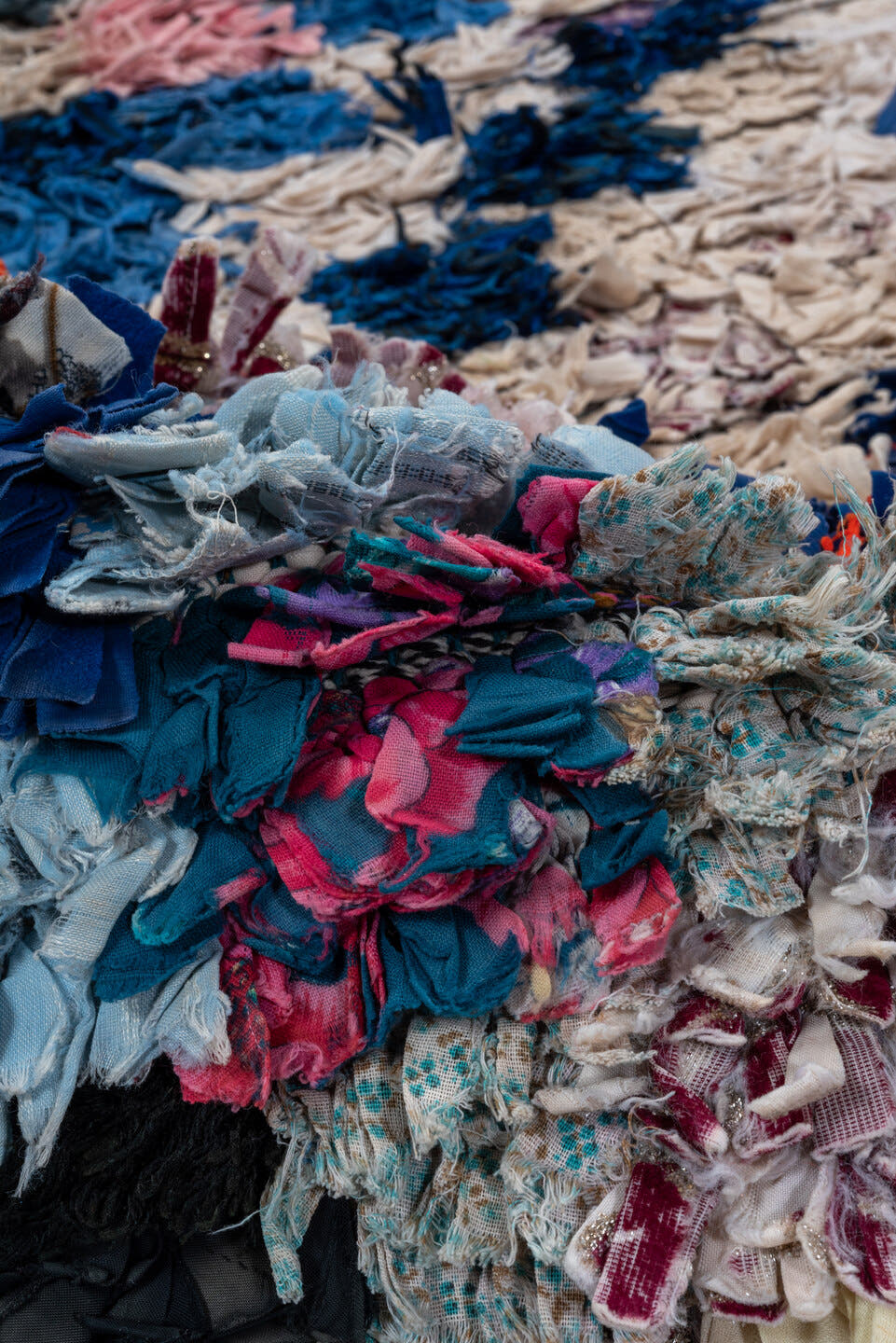 2' x 6' one-of-a-kind handmade vintage Rag Rug runner rug. Color palette: ivory, slate, turquoise, blue, brown, pink, coral