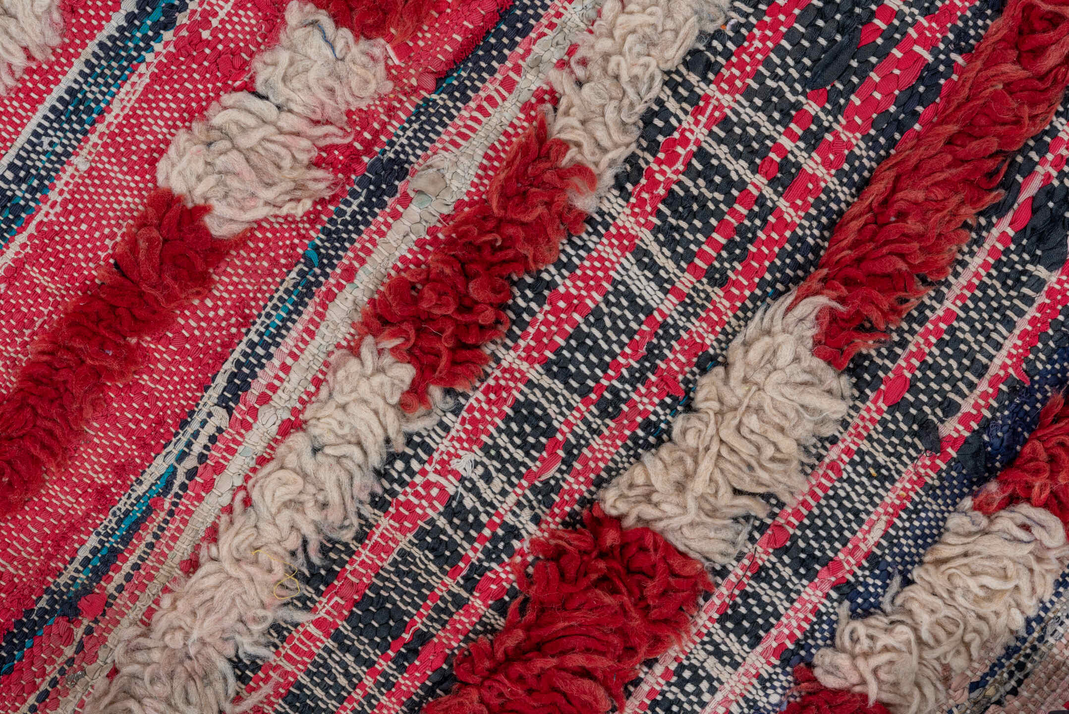 2' x 6' one-of-a-kind handmade vintage Rag Rug runner rug. Color palette: ivory, crimson, rose, charcoal, navy, gold, red