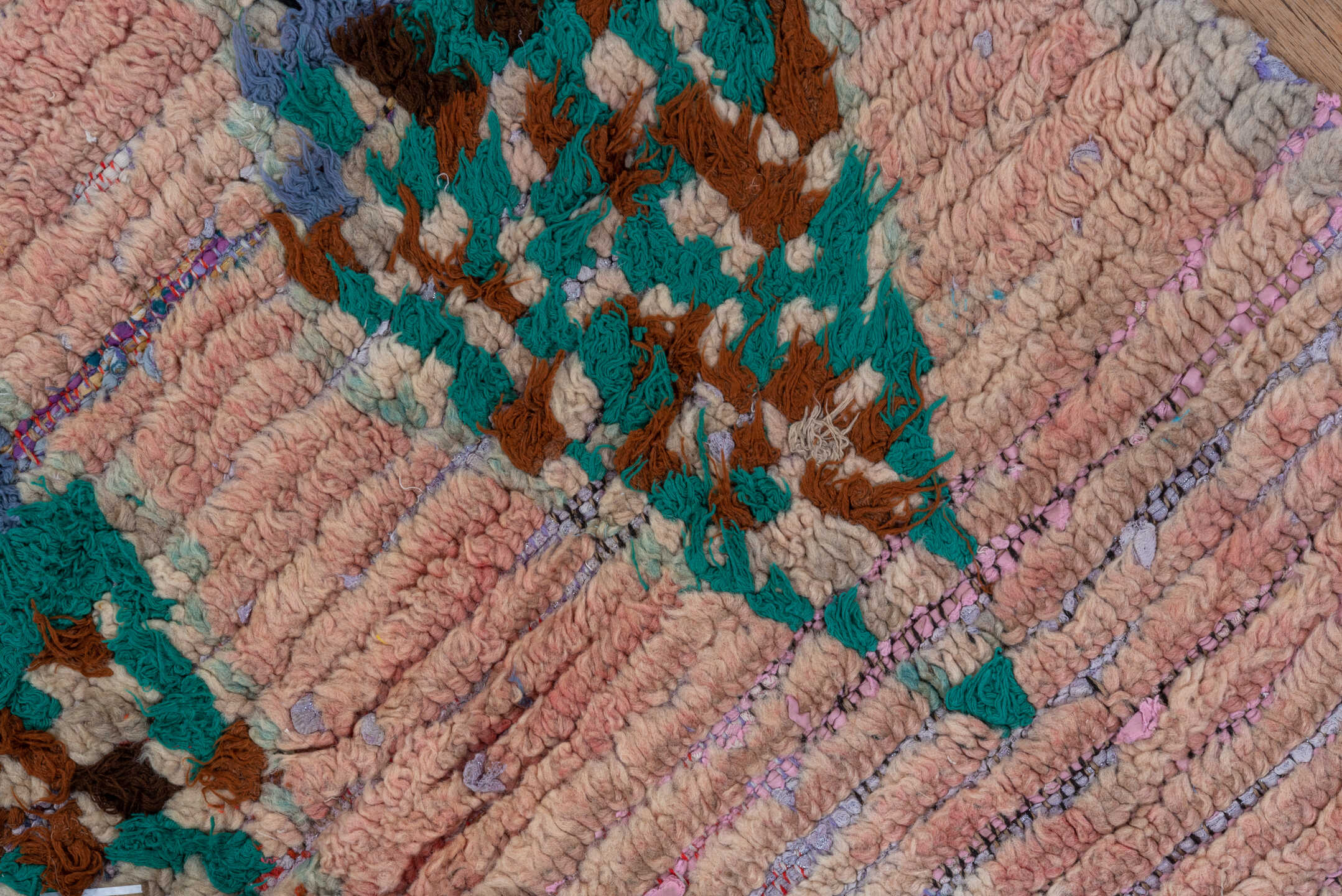 2' x 6' one-of-a-kind handmade vintage Rag Rug runner rug. Color palette: blue, brown, gray, green, pink, redwood