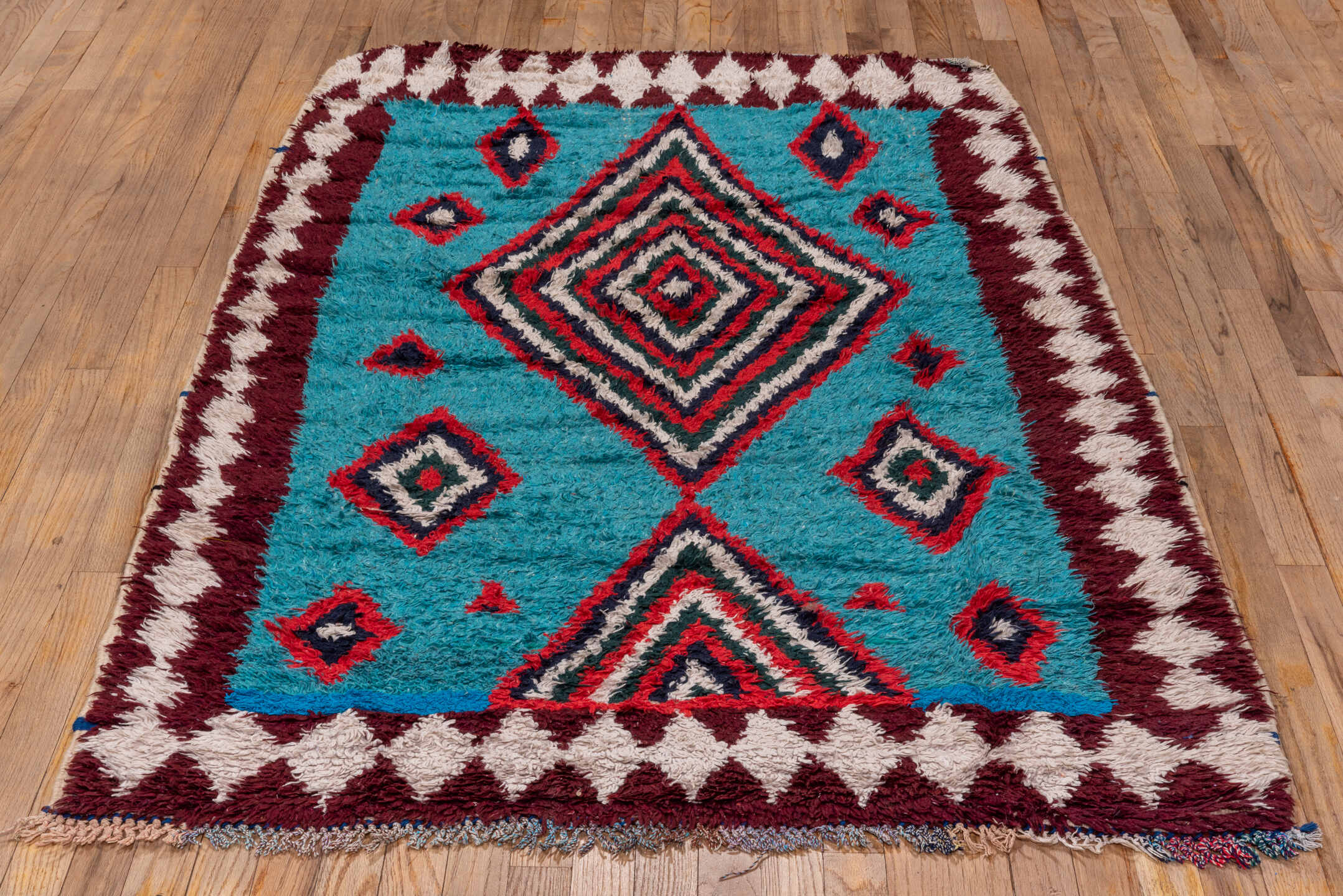 3' x 6' one-of-a-kind handmade vintage Rag Rug small size rug. Color palette: turquoise, ivory, burgundy, crimson, navy