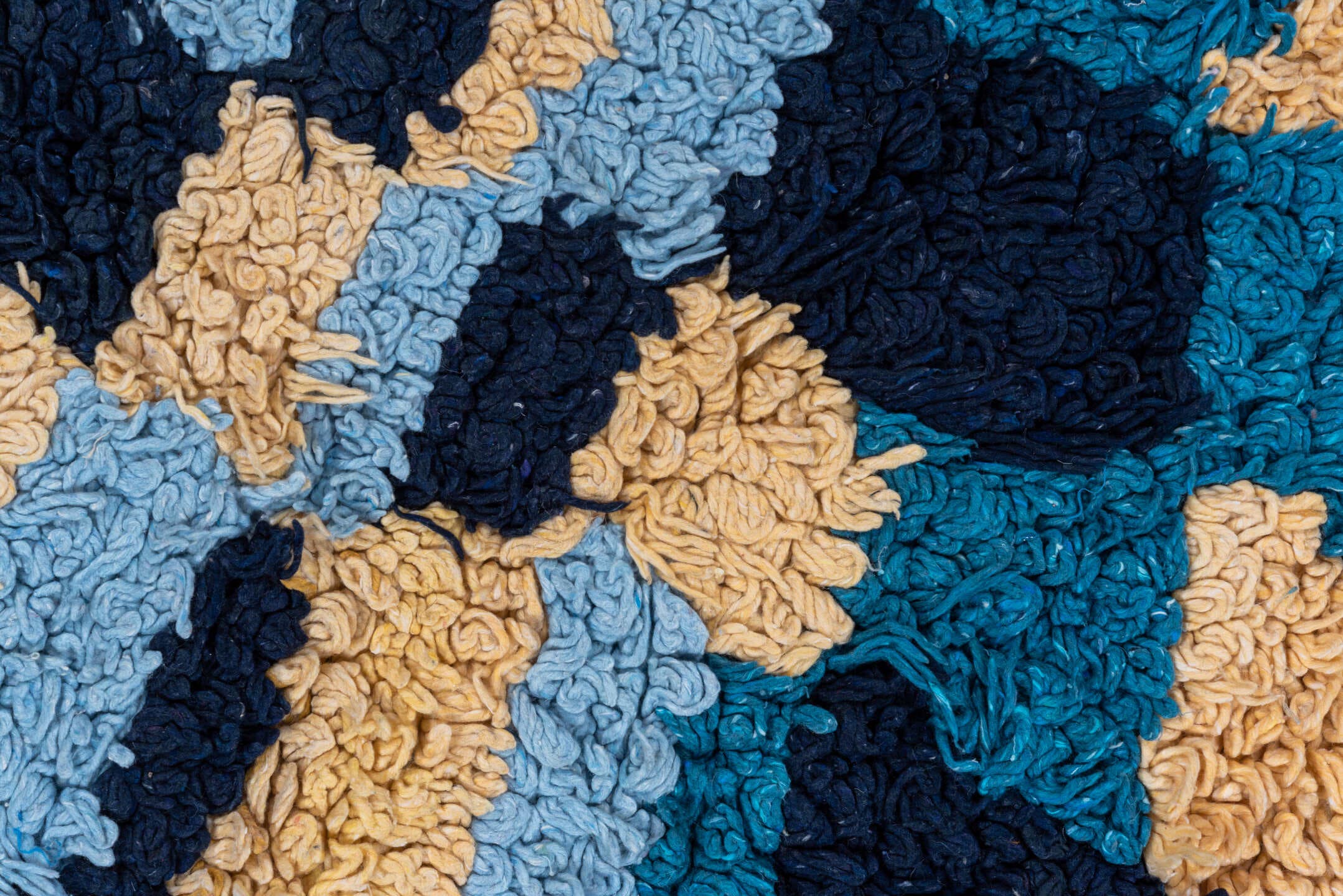 3' x 6' one-of-a-kind handmade vintage Rag Rug runner rug. Color palette: light blue, cream, navy, teal, rust, black, ivory