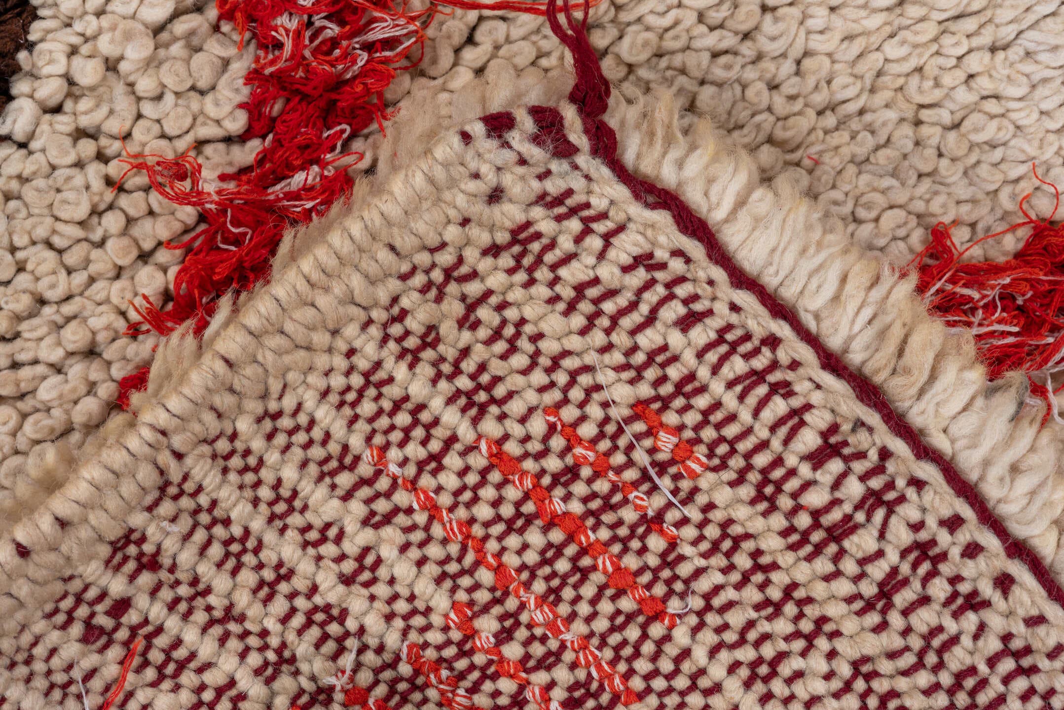 1' x 4' one-of-a-kind handmade vintage Moroccan small size rug. Color palette: ivory, crimson, brown, burgundy, blue, green