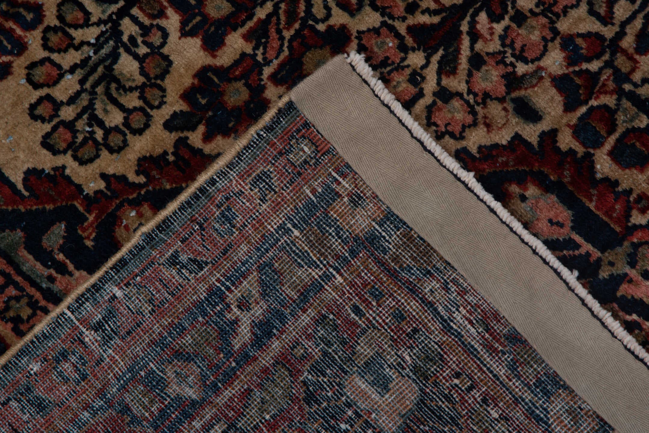 5' x 7' one-of-a-kind handmade antique Sarouk rug. Color palette: ivory, rust, navy, rose, soft blue, burgundy, taupe