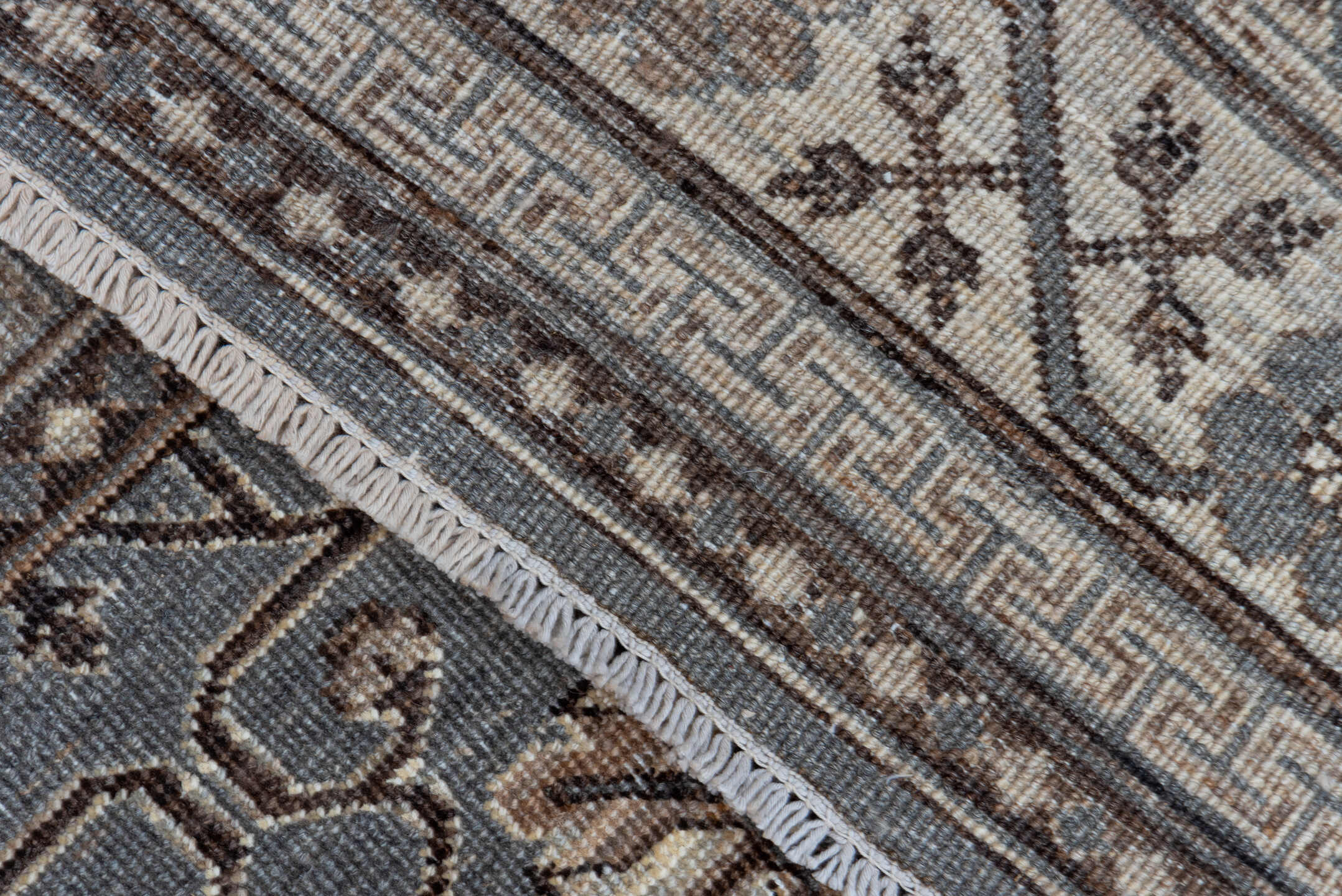 5' x 7' one-of-a-kind handmade vintage Khotan rug. Color palette: brown, dim gray, gray, light gray, off-white, pink