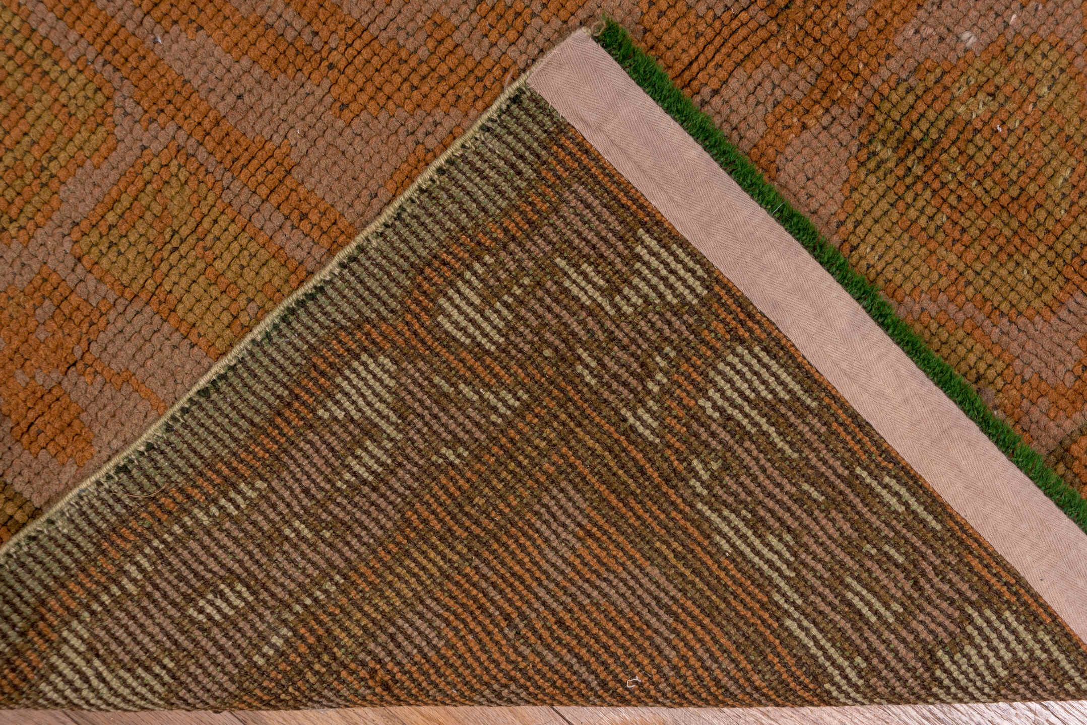 4' x 13' one-of-a-kind handmade handmade Donegal runner rug. Color palette: terra cotta, rust, taupe, olive, sage, brown