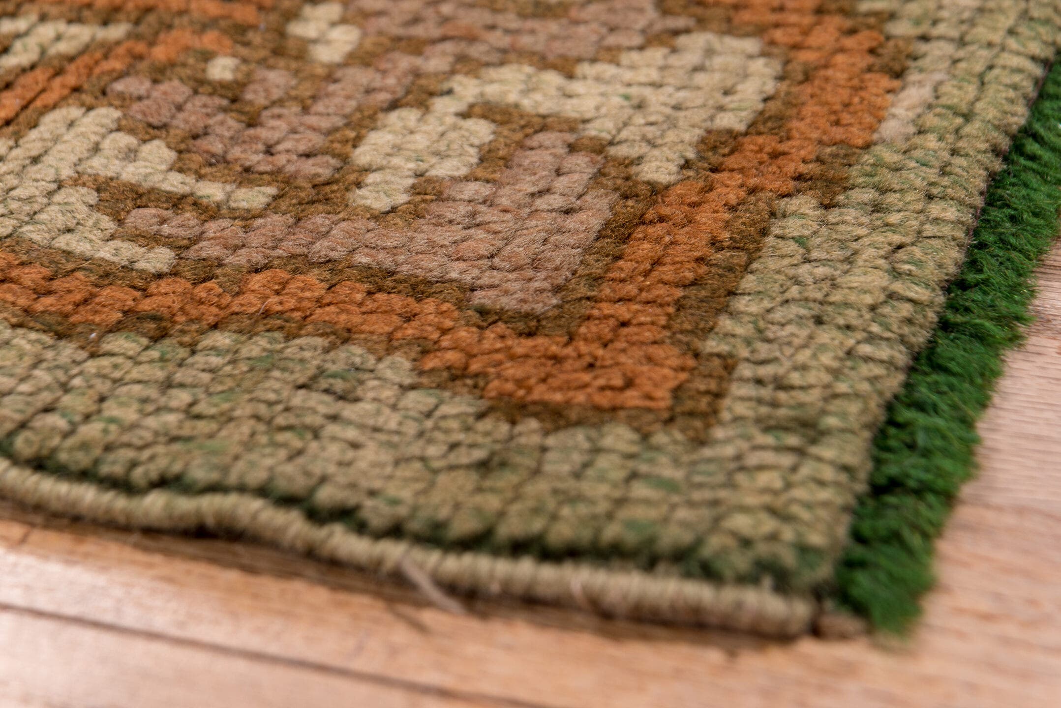 4' x 13' one-of-a-kind handmade handmade Donegal runner rug. Color palette: terra cotta, rust, taupe, olive, sage, brown