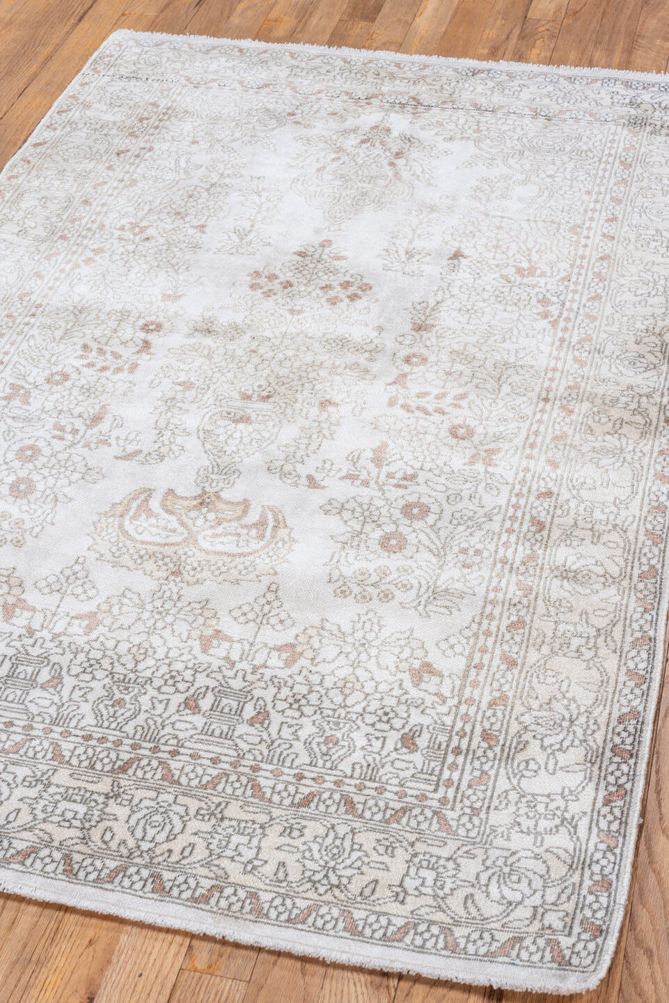 3' x 5' one-of-a-kind handmade antique Kashmir small size rug. Color palette: ivory, taupe, soft rose, beige, camel