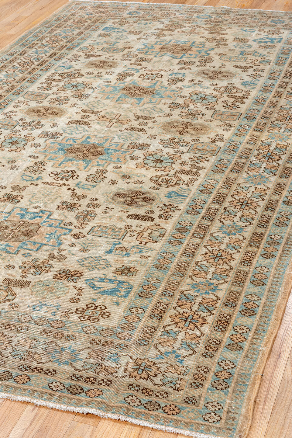 5' x 8' one-of-a-kind handmade antique Ardebil medium size rug. Color palette: ivory, sky blue, taupe, camel, brown, beige