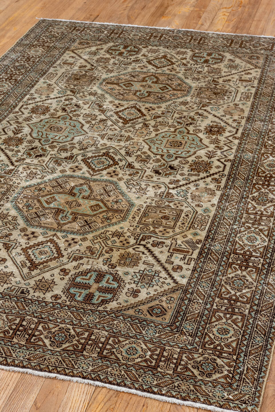 4' x 6' one-of-a-kind handmade vintage Ardebil small size rug. Color palette: ivory, brown, sky_blue, taupe, camel, charcoal