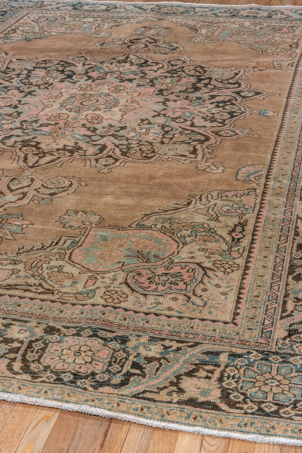 9' x 11' one-of-a-kind handmade antique Heriz large size rug. Color palette: camel, charcoal, ivory, pale blue, blush, taupe