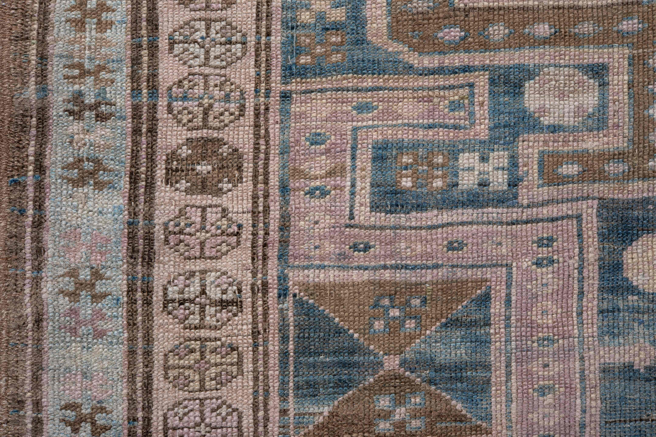 3' x 9' one-of-a-kind handmade antique Caucasian runner rug. Color palette: sky blue, ivory, taupe, brown, rust, rose, slate
