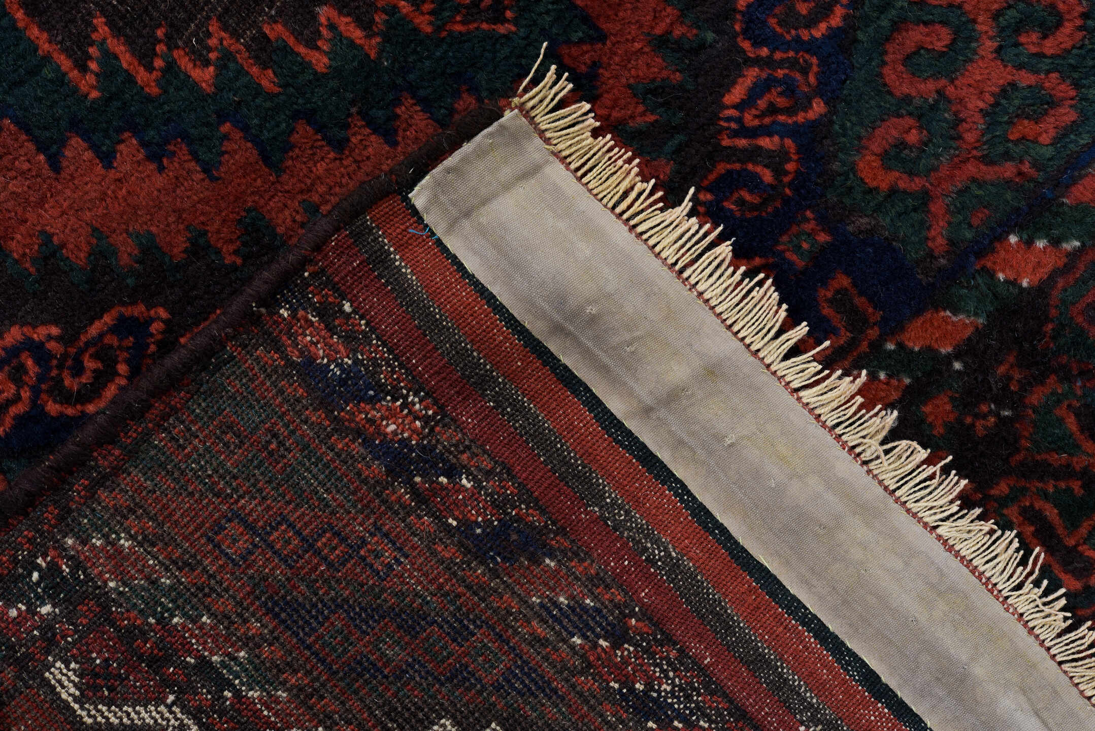 3' x 8' one-of-a-kind handmade vintage Belouch runner rug. Color palette: crimson, black, burgundy, ivory, charcoal, red