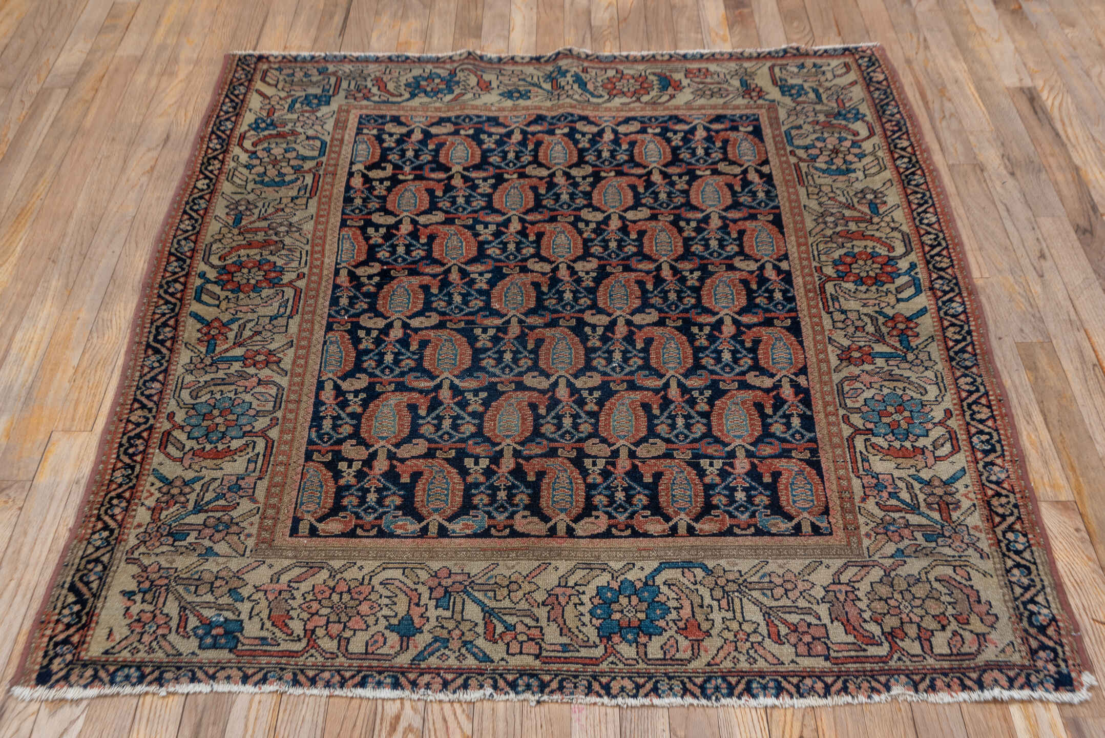 4' x 5' one-of-a-kind handmade vintage Malayer small size rug. Color palette: ivory, navy, rust, blue, camel, rose
