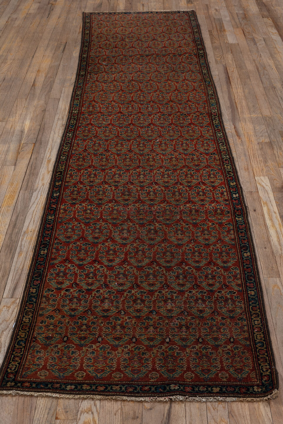 2' x 11' one-of-a-kind handmade antique Malayer runner rug. Color palette: rust, navy, ivory, camel, slate, brown