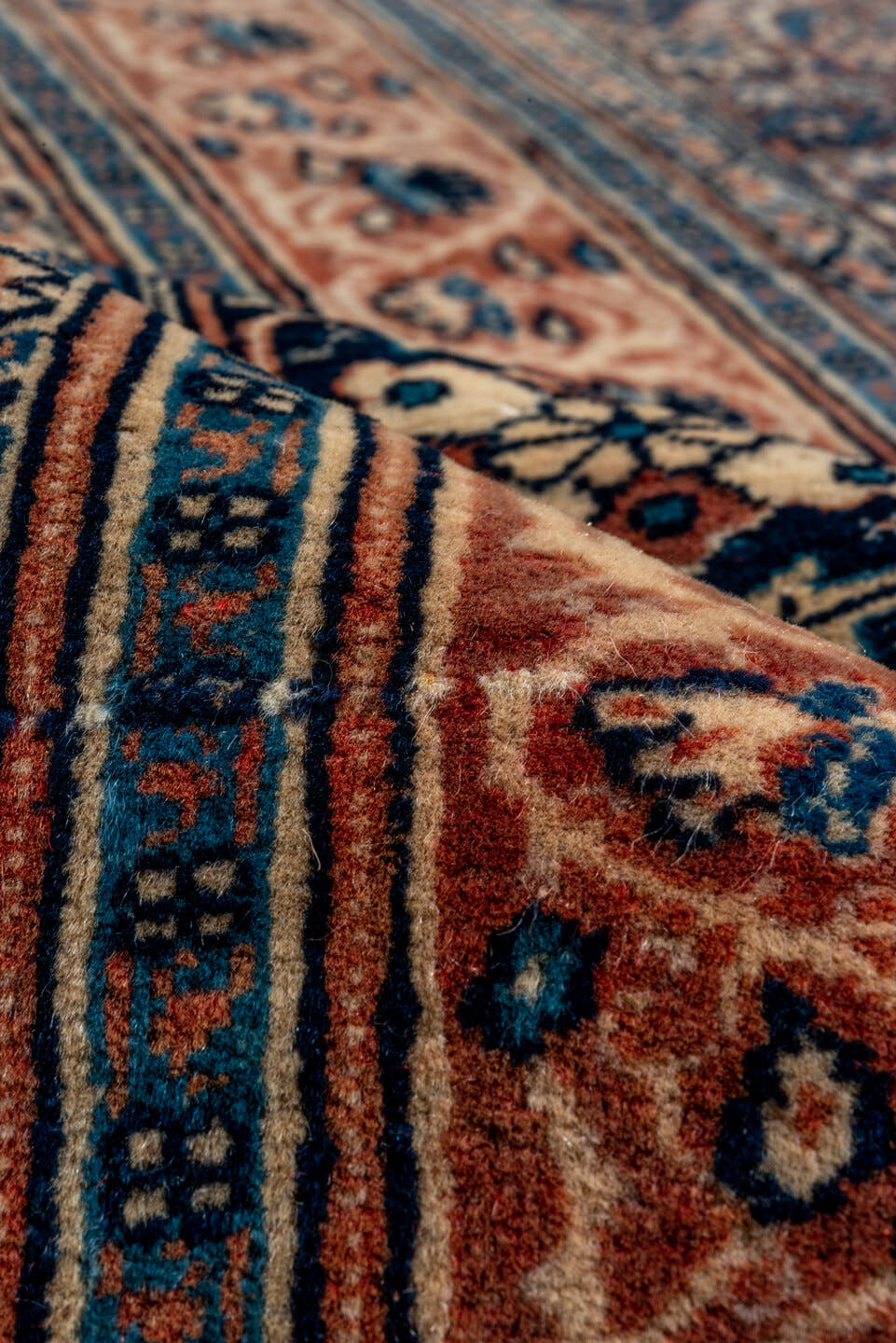 12' x 19' one-of-a-kind handmade antique Tabriz oversize rug. Color palette: navy, rust, ivory, terra cotta, indigo, camel