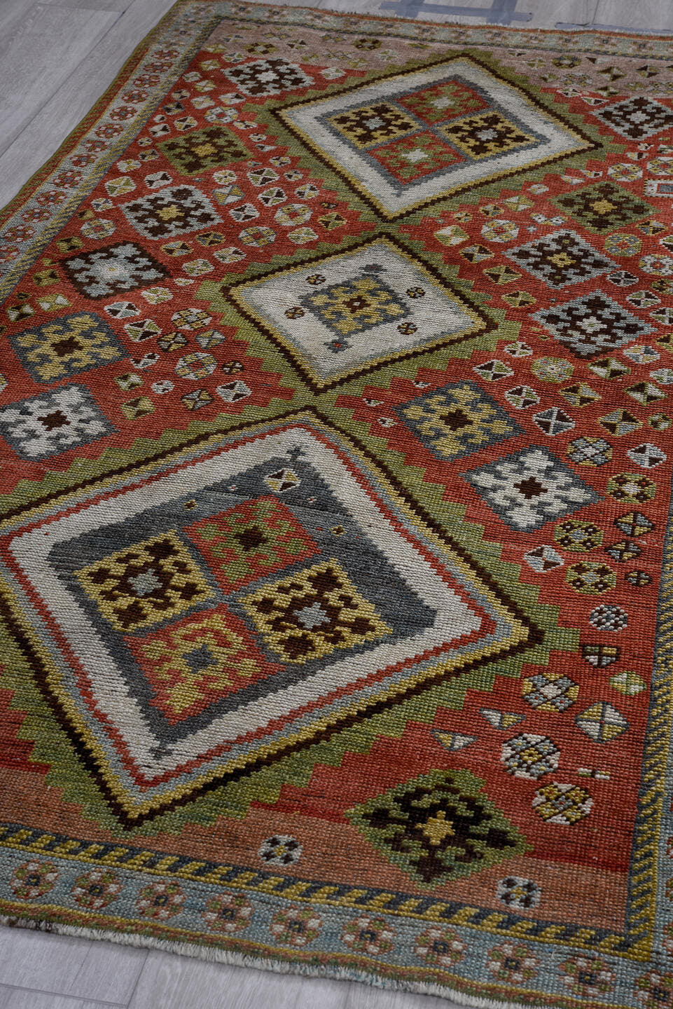 4' x 7' one-of-a-kind handmade vintage Gabbe rug. Color palette: rust, ivory, olive, slate, taupe, charcoal, sage, crimson