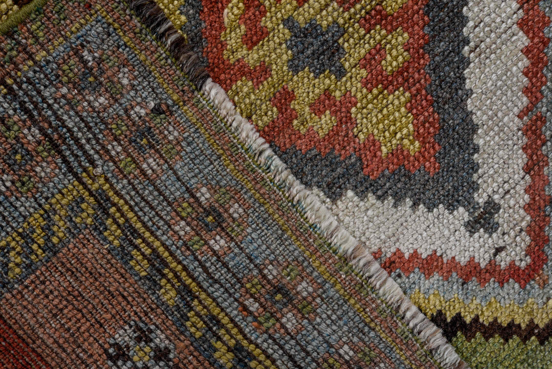 4' x 7' one-of-a-kind handmade vintage Gabbe rug. Color palette: rust, ivory, olive, slate, taupe, charcoal, sage, crimson