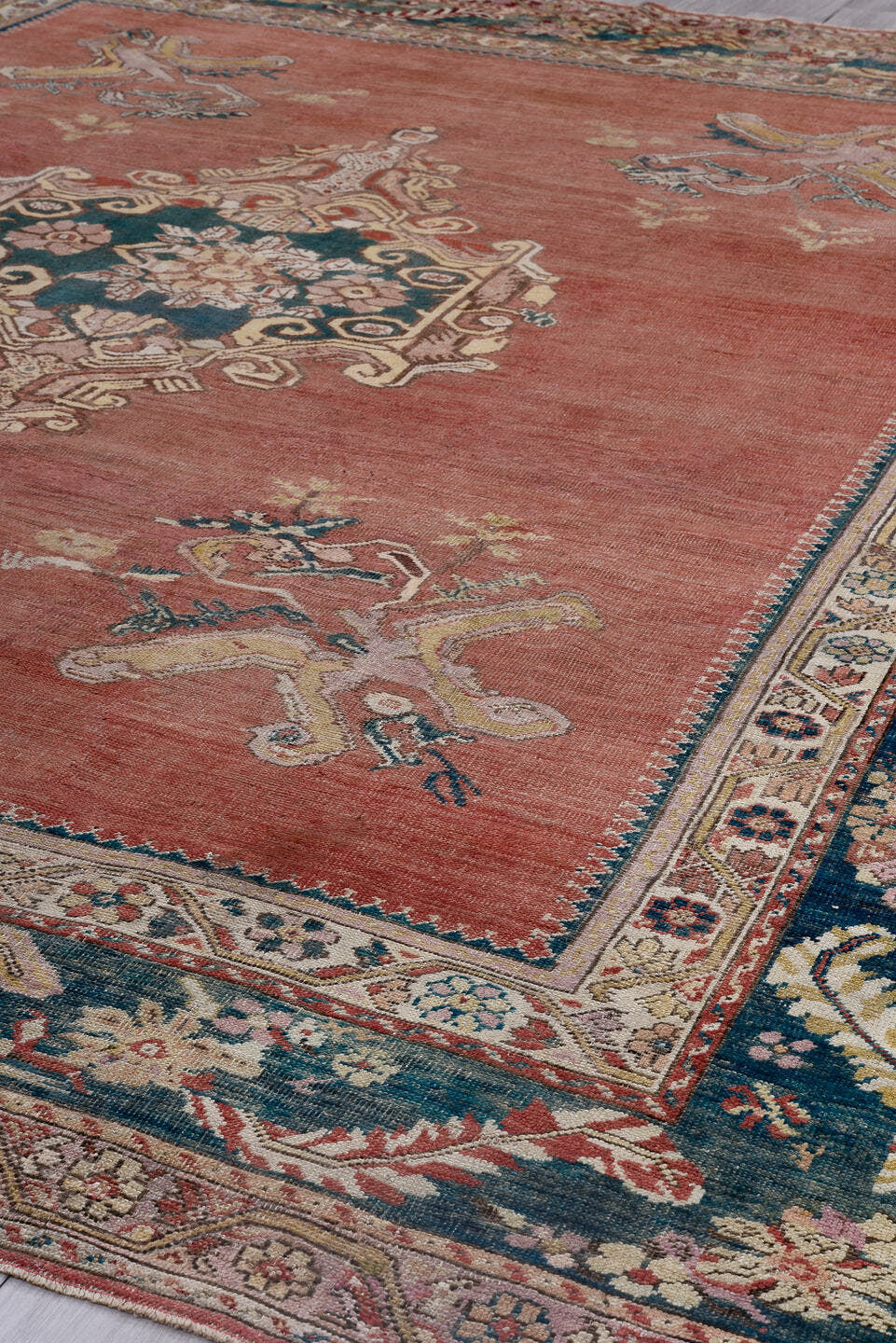 12' x 13' one-of-a-kind handmade antique Oushak oversize rug. Color palette: rose, teal, ivory, taupe, dusty pink, sage