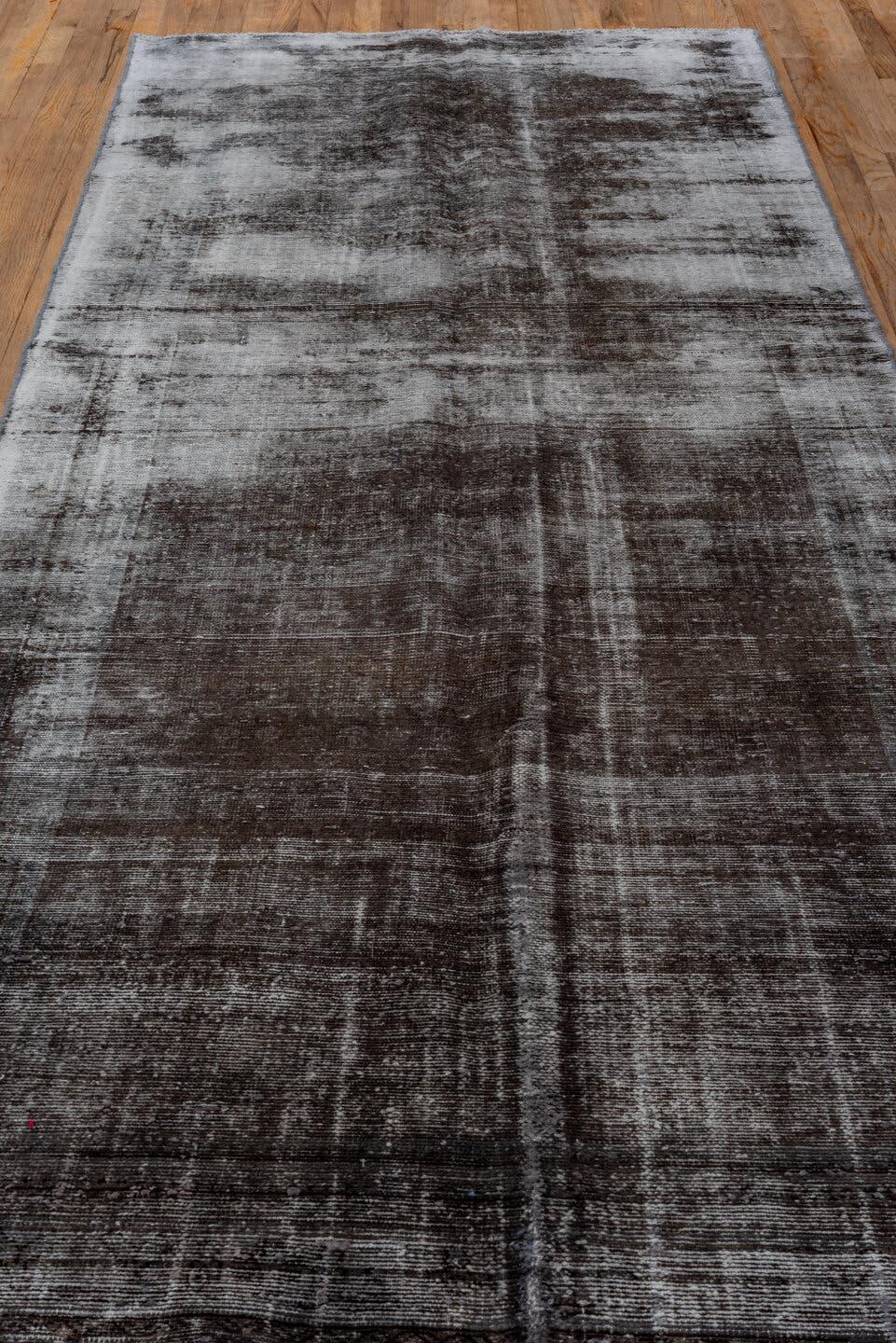 4' x 11' one-of-a-kind handmade vintage Distressed runner rug. Color palette: charcoal, silver, gray, taupe, black, beige