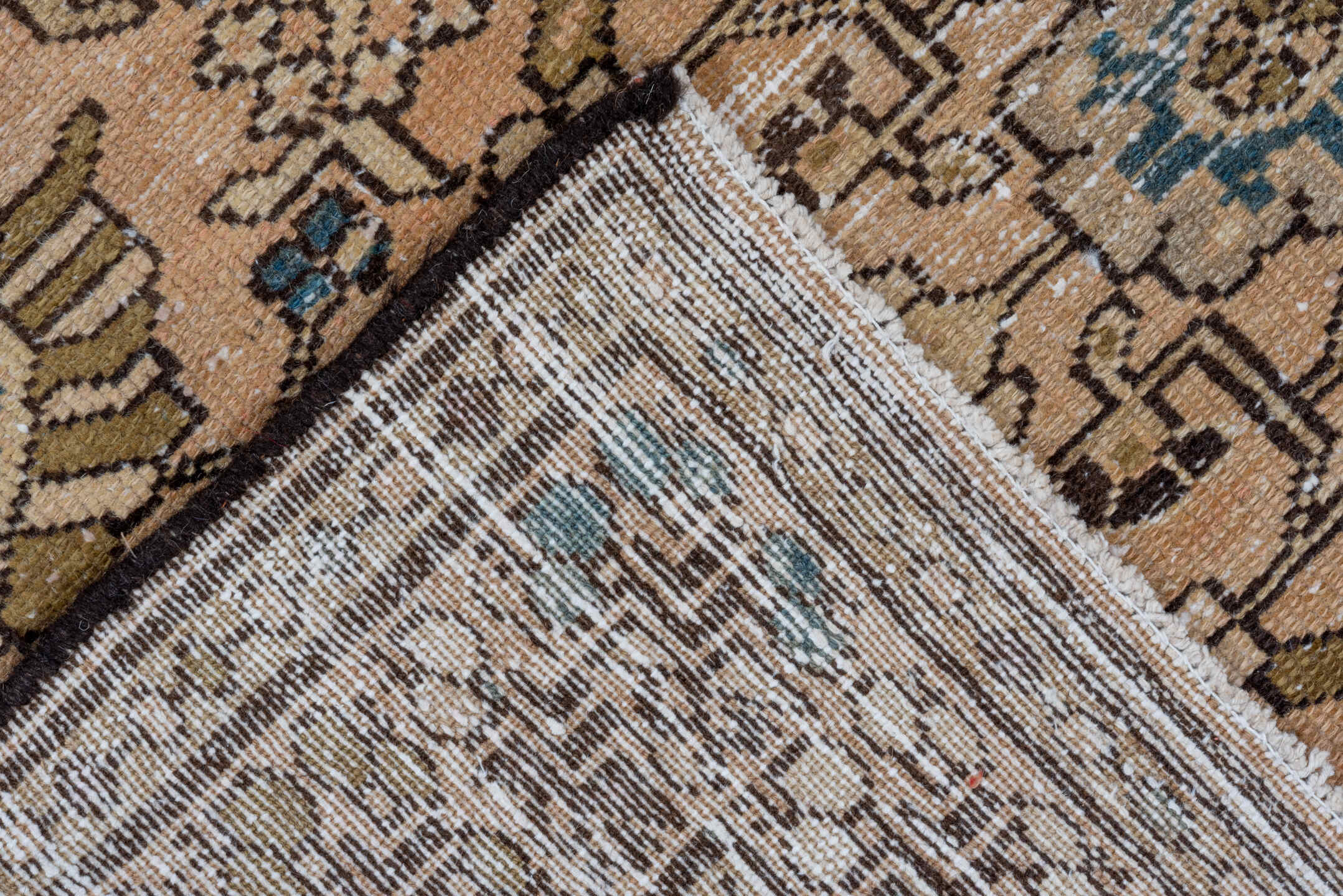 5' x 9' one-of-a-kind handmade vintage Distressed medium size rug. Color palette: tan, ivory, brown, muted blue, taupe
