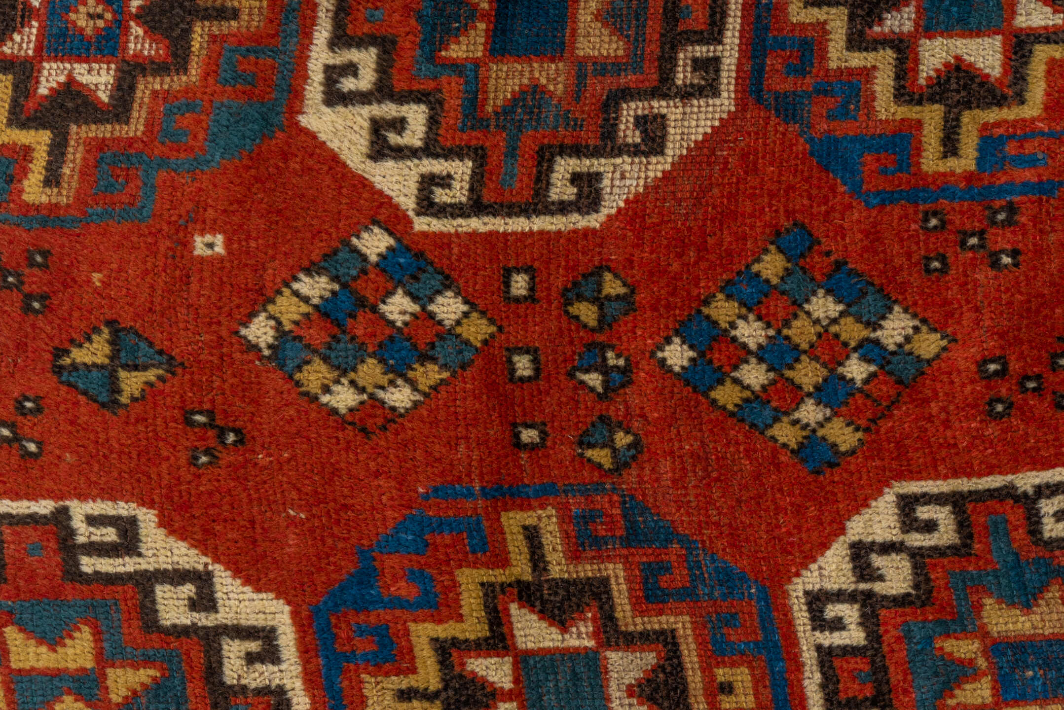 4' x 7' one-of-a-kind handmade vintage Kazak rug. Color palette: arapawa, blue, brown, fiord, gray, light gray, pink, red