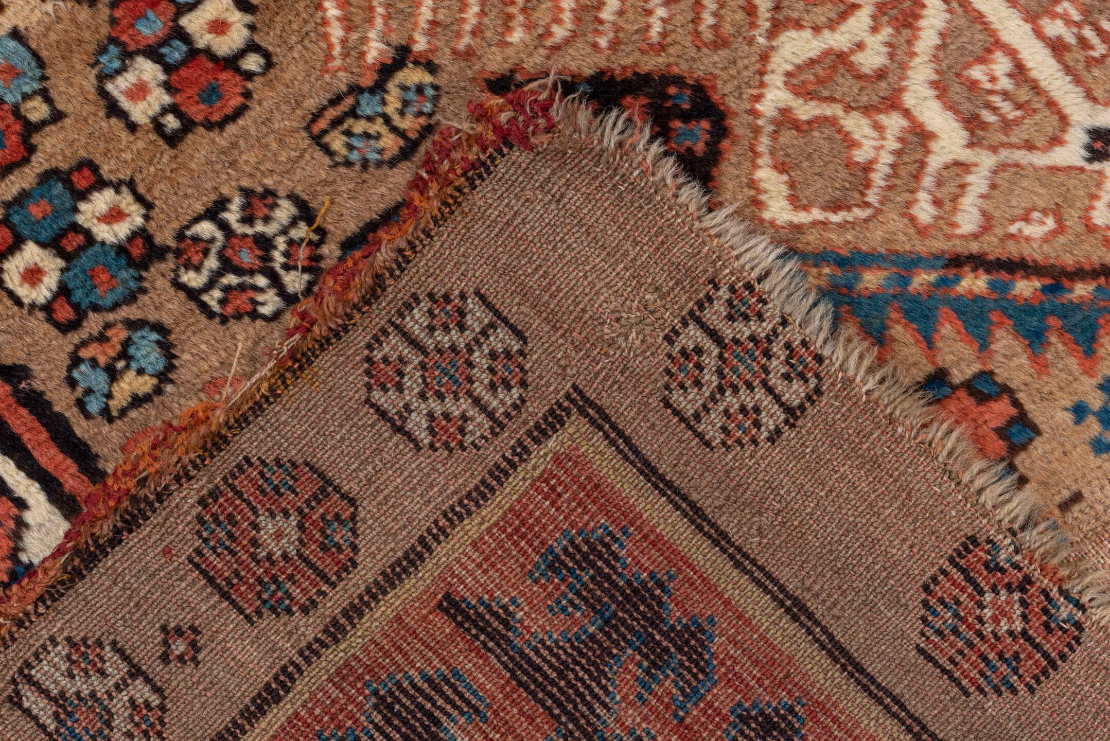 4' x 8' one-of-a-kind handmade antique Sarab runner rug. Color palette: camel, taupe, ivory, rust, indigo, brown, slate