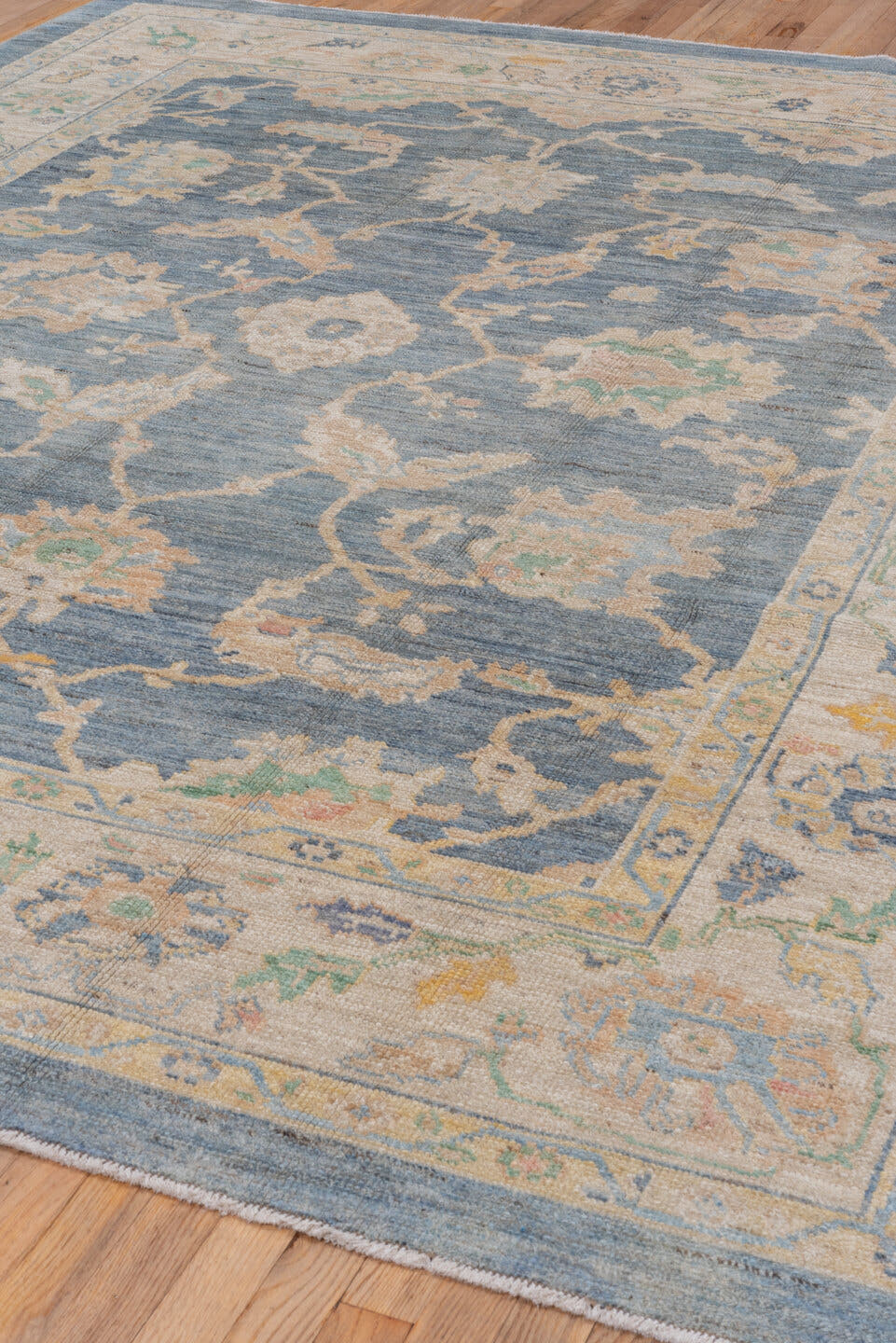 8' x 9' one-of-a-kind handmade vintage Oushak rug. Color palette: light blue, ivory, cream, sage, gold, taupe, pale aqua