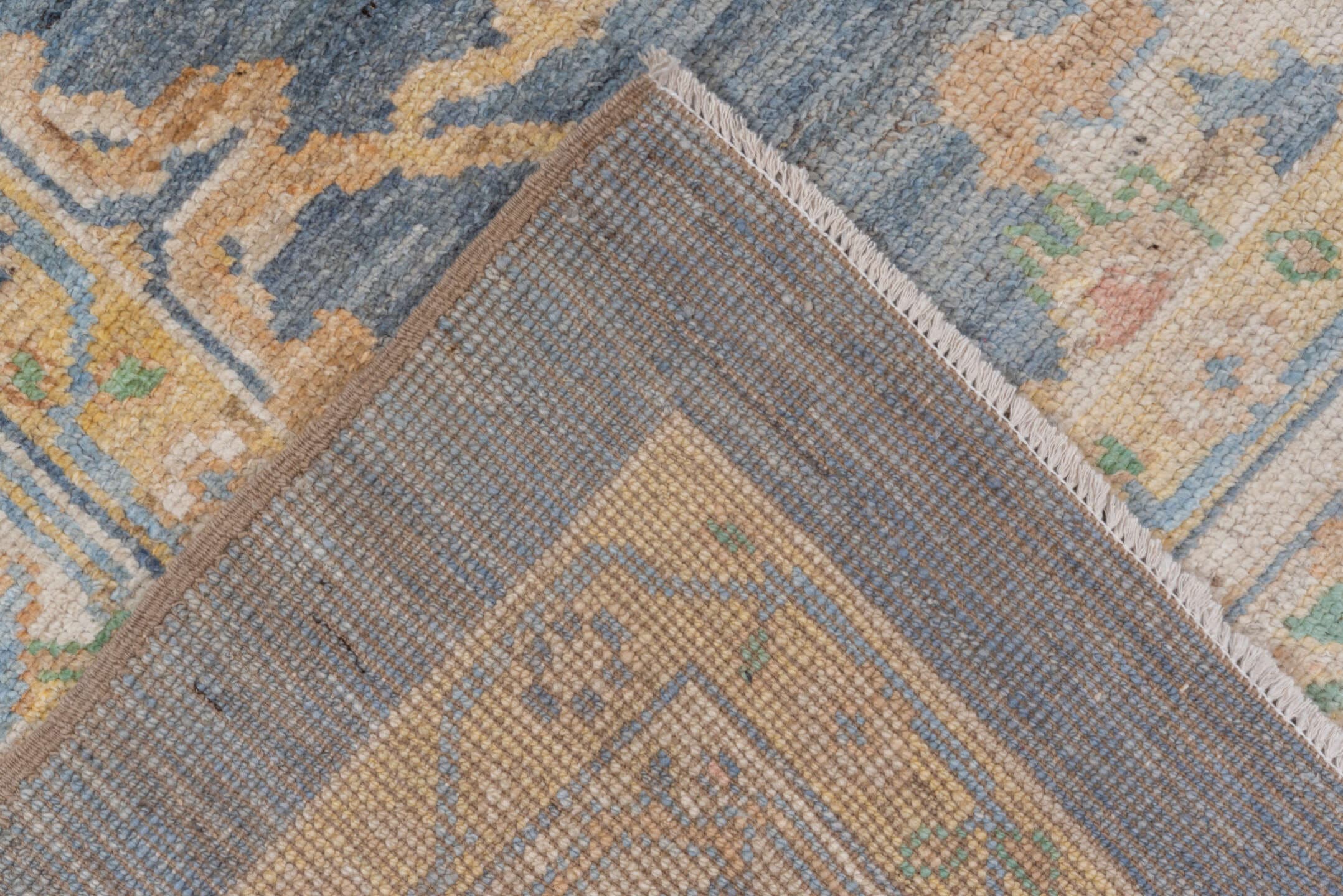8' x 9' one-of-a-kind handmade vintage Oushak rug. Color palette: light blue, ivory, cream, sage, gold, taupe, pale aqua