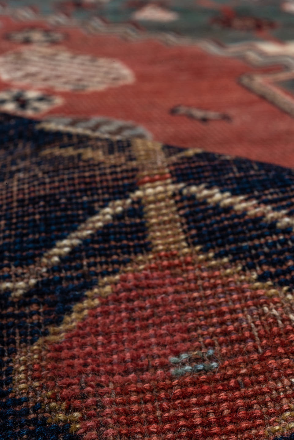 5' x 8' one-of-a-kind handmade antique Qashqai medium size rug. Color palette: rust, indigo, ivory, slate, terra cotta