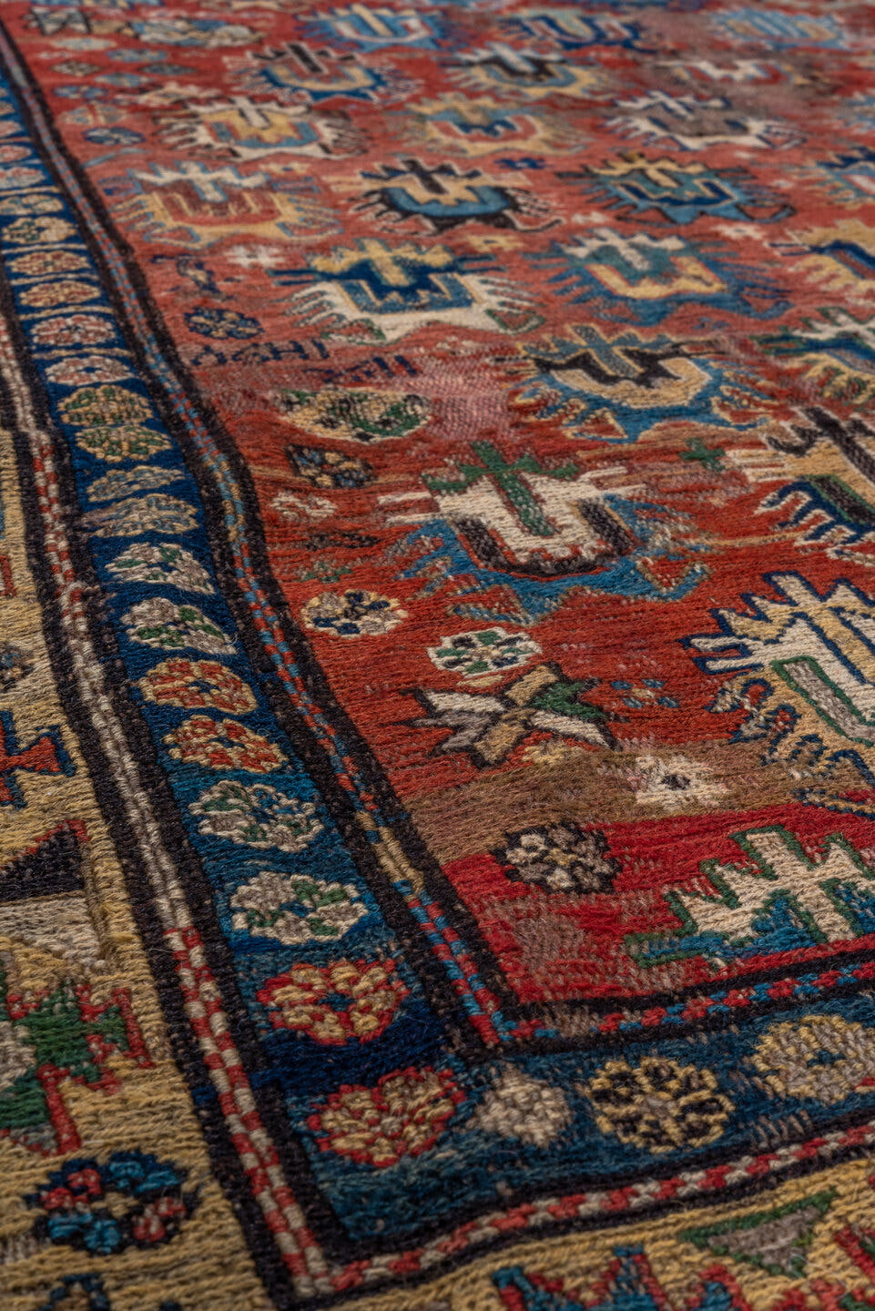 3' x 7' one-of-a-kind handmade antique Sumak runner rug. Color palette: rust, ivory, navy, indigo, camel, gold, crimson
