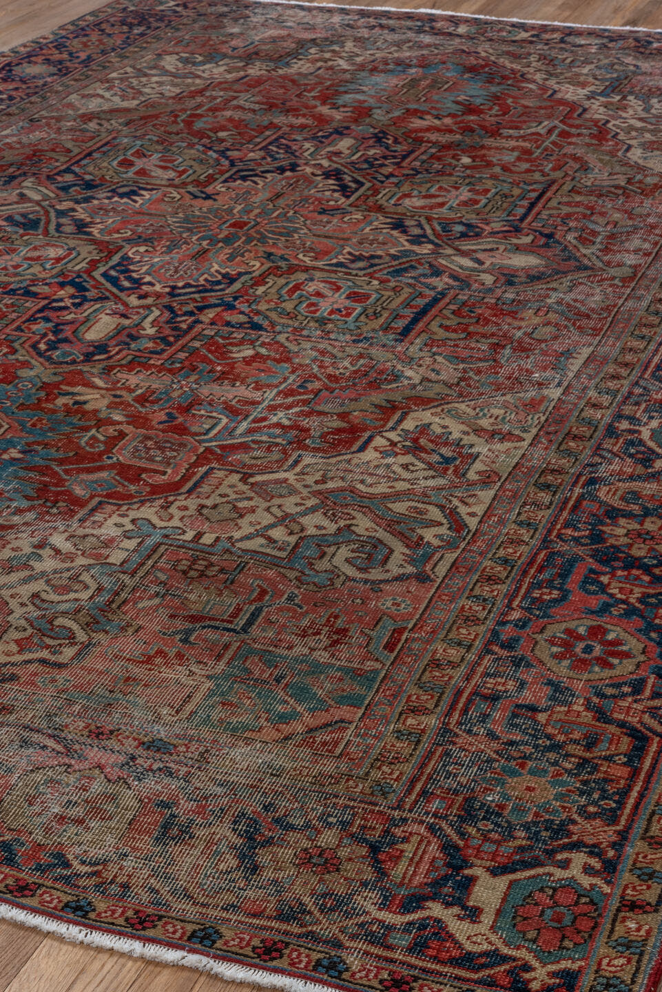 8' x 12' one-of-a-kind handmade antique Heriz large size rug. Color palette: brick red, ivory, navy, dusty teal, taupe, rose