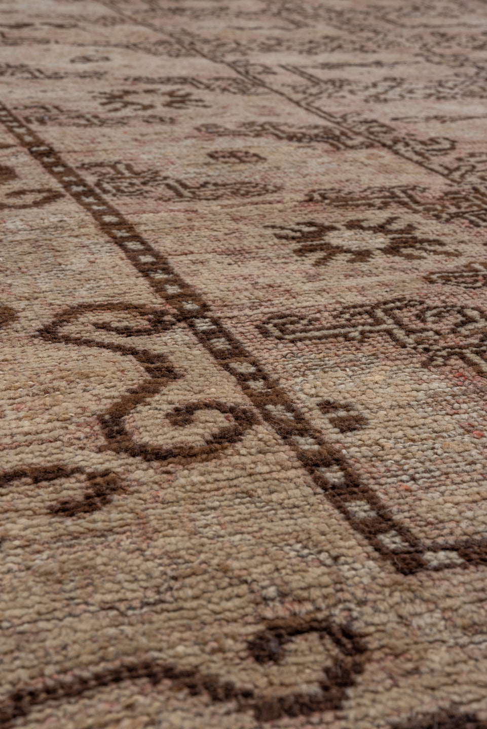 6' x 9' one-of-a-kind handmade vintage Khotan medium size rug. Color palette: black, brown, gray, light gray, pink