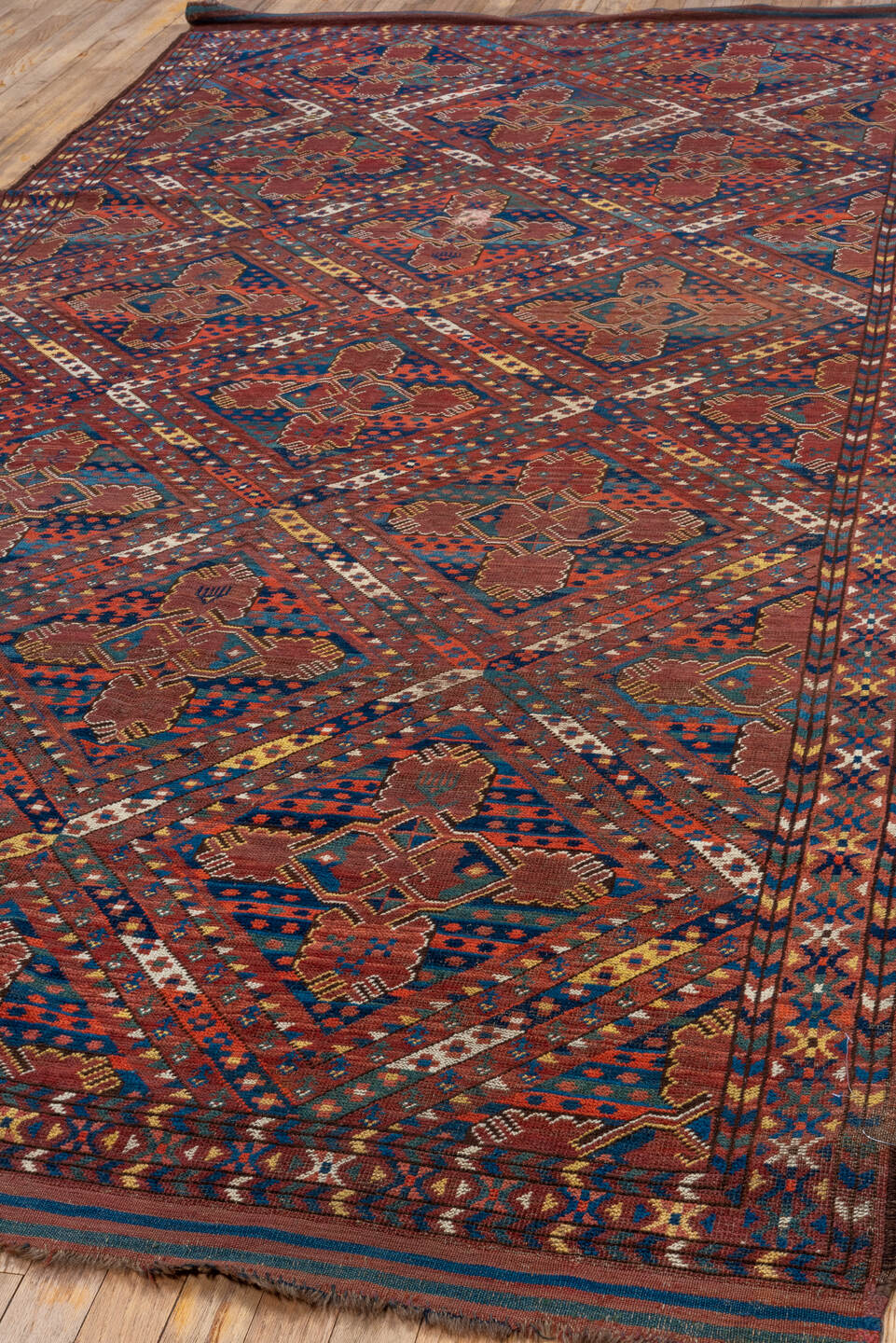 5' x 10' one-of-a-kind handmade antique Beshir medium size rug. Color palette: rust, navy, burgundy, ivory, terra cotta