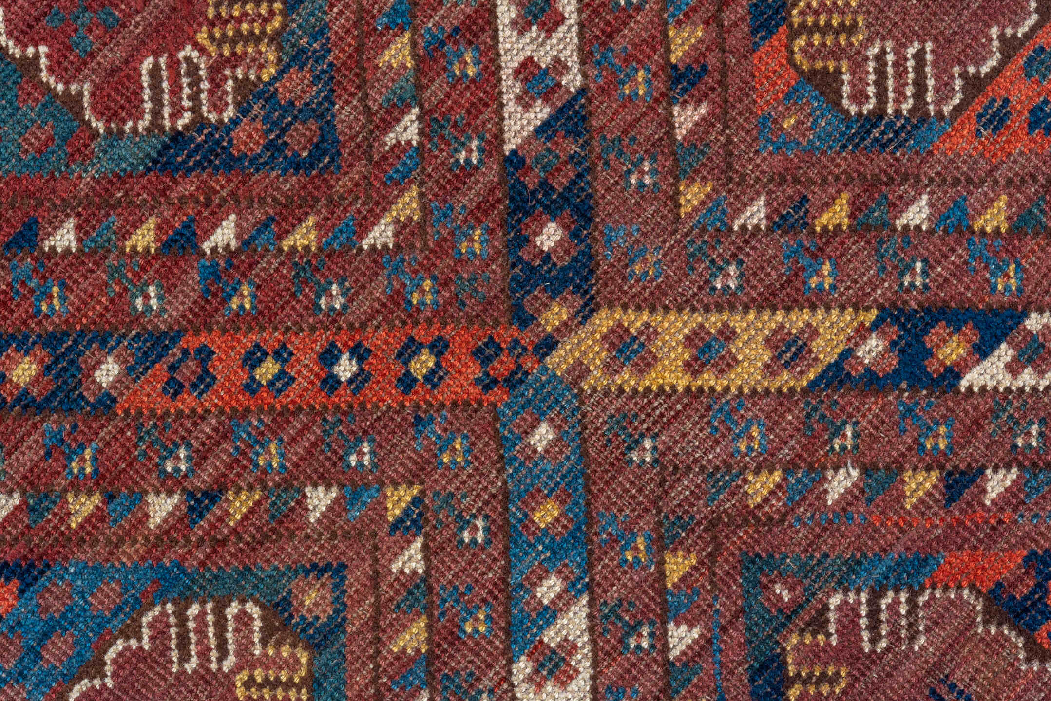 5' x 10' one-of-a-kind handmade antique Beshir medium size rug. Color palette: rust, navy, burgundy, ivory, terra cotta