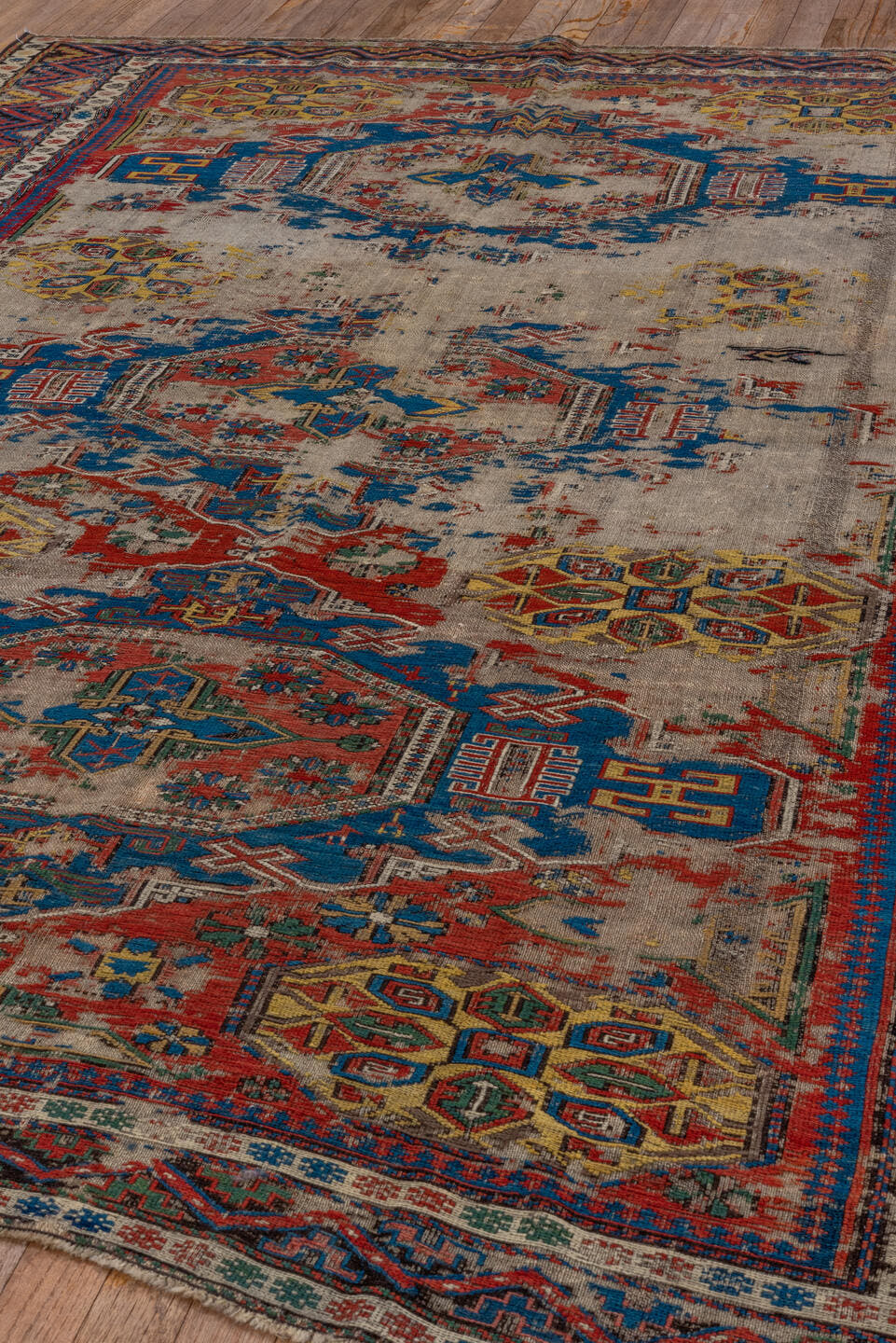 6' x 7' one-of-a-kind handmade antique Sumak rug. Color palette: ivory, indigo, rust, crimson, gold, charcoal, saffron, teal