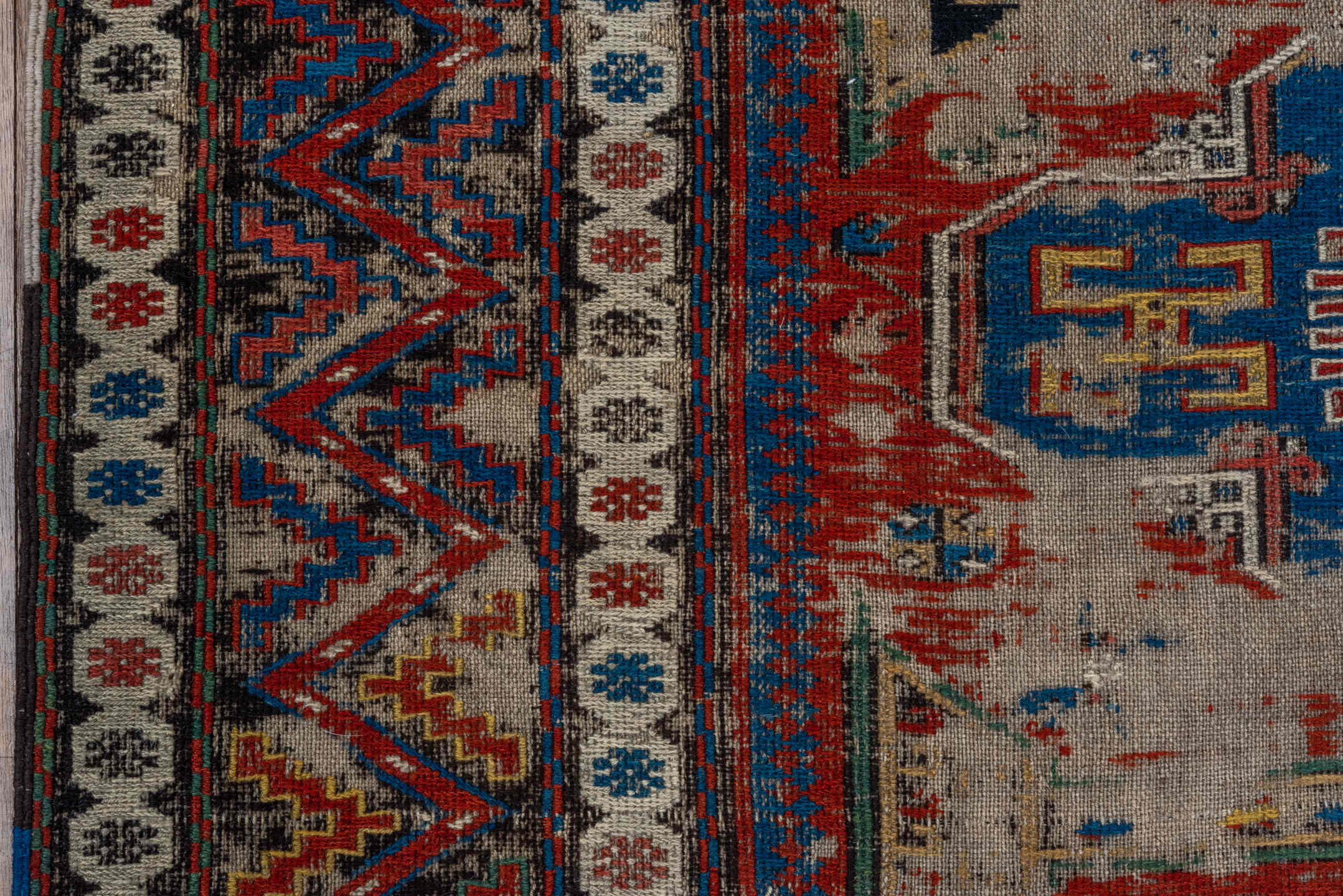 6' x 7' one-of-a-kind handmade antique Sumak rug. Color palette: ivory, indigo, rust, crimson, gold, charcoal, saffron, teal