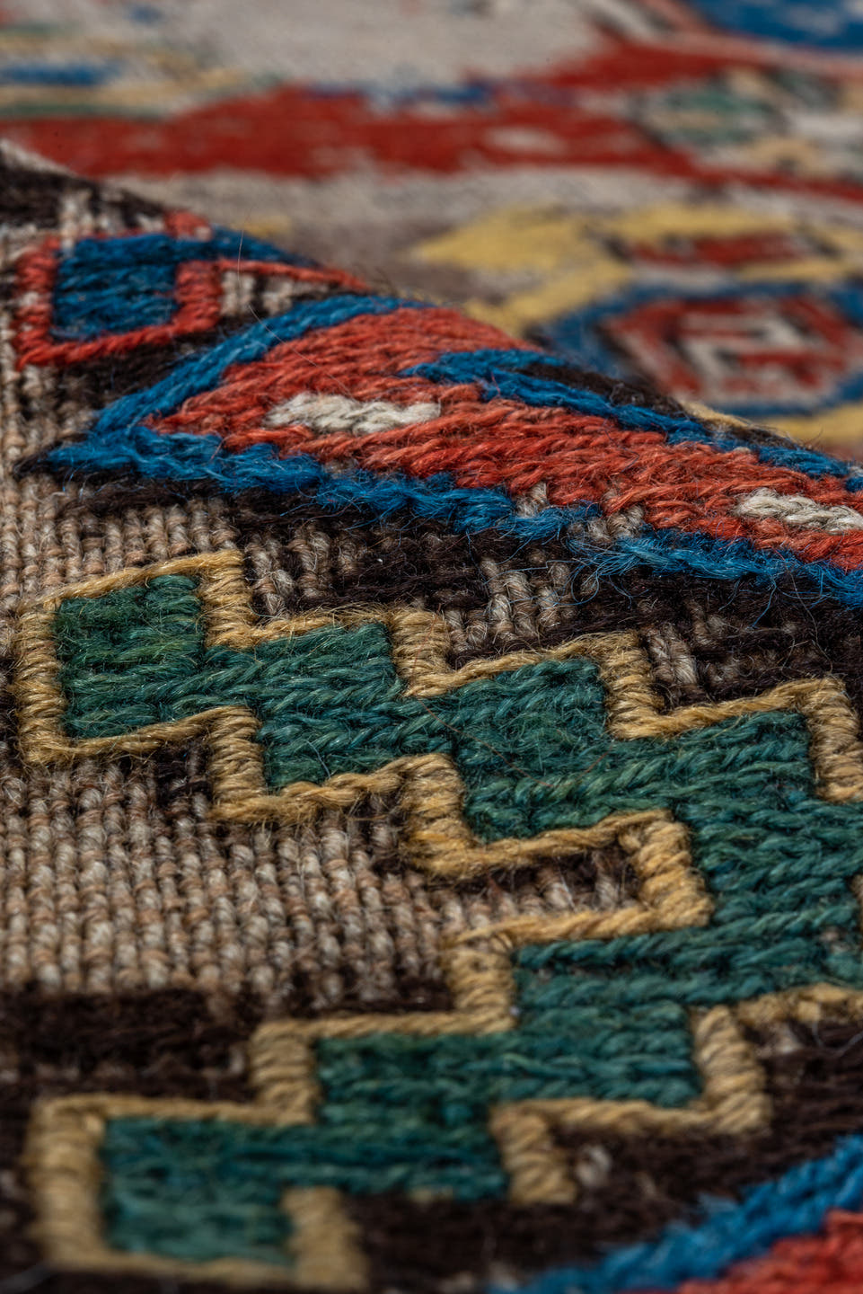 6' x 7' one-of-a-kind handmade antique Sumak rug. Color palette: ivory, indigo, rust, crimson, gold, charcoal, saffron, teal